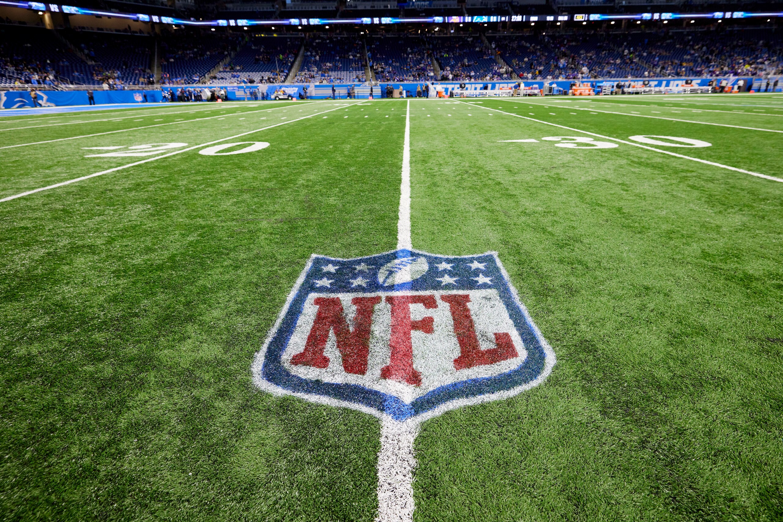 NFL logo on the field during an NFL football game, Sunday, Dec. 5, 2021, in Detroit. (AP Photo/Rick Osentoski)