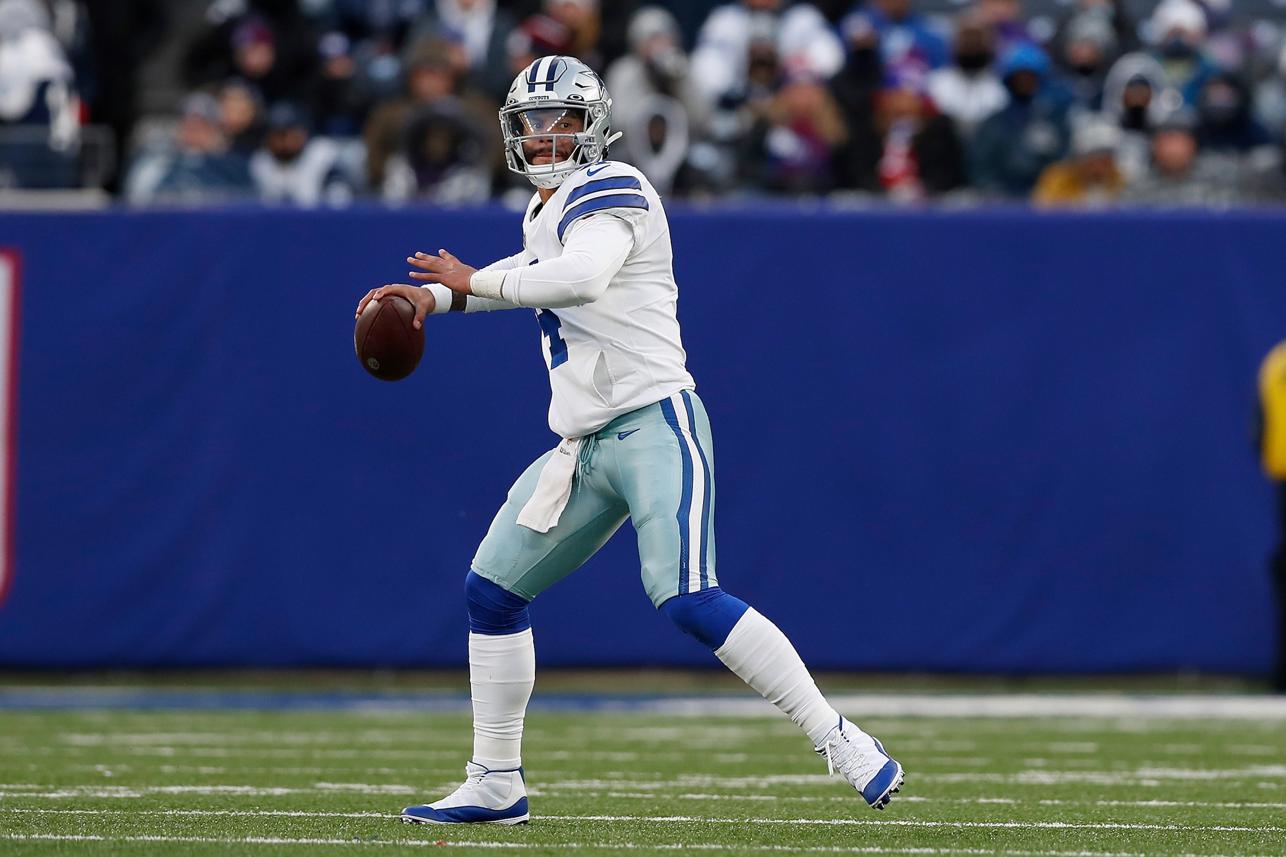 Dallas Cowboys quarterback Dak Prescott (4) passes the ball during an NFL football game against the New York Giants, Sunday, Dec. 19, 2021, in East Rutherford, N.J. (AP Photo/Steve Luciano)