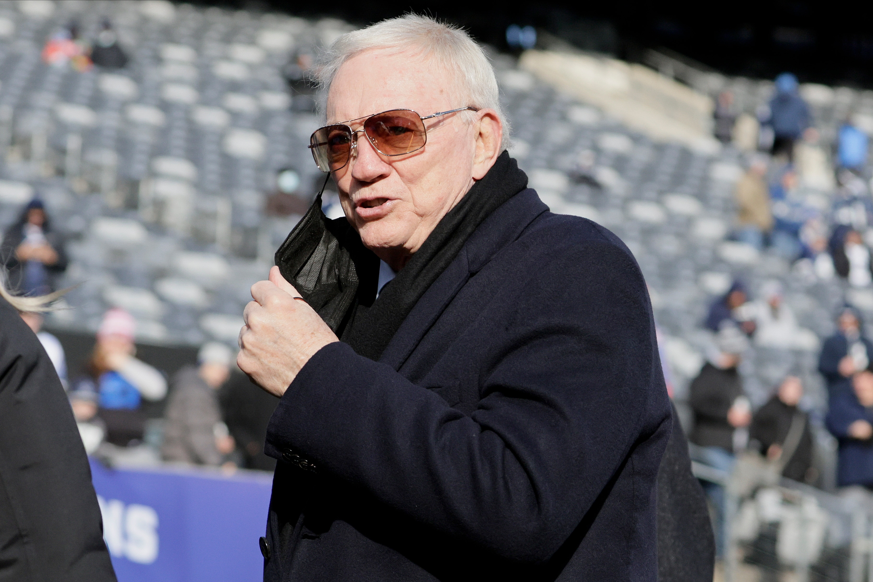 Dallas Cowboys owner Jerry Jones walks on the field before an NFL football game between the New York Giants and the Dallas Cowboys, Sunday, Dec. 19, 2021, in East Rutherford, N.J. (AP Photo/Corey Sipkin)