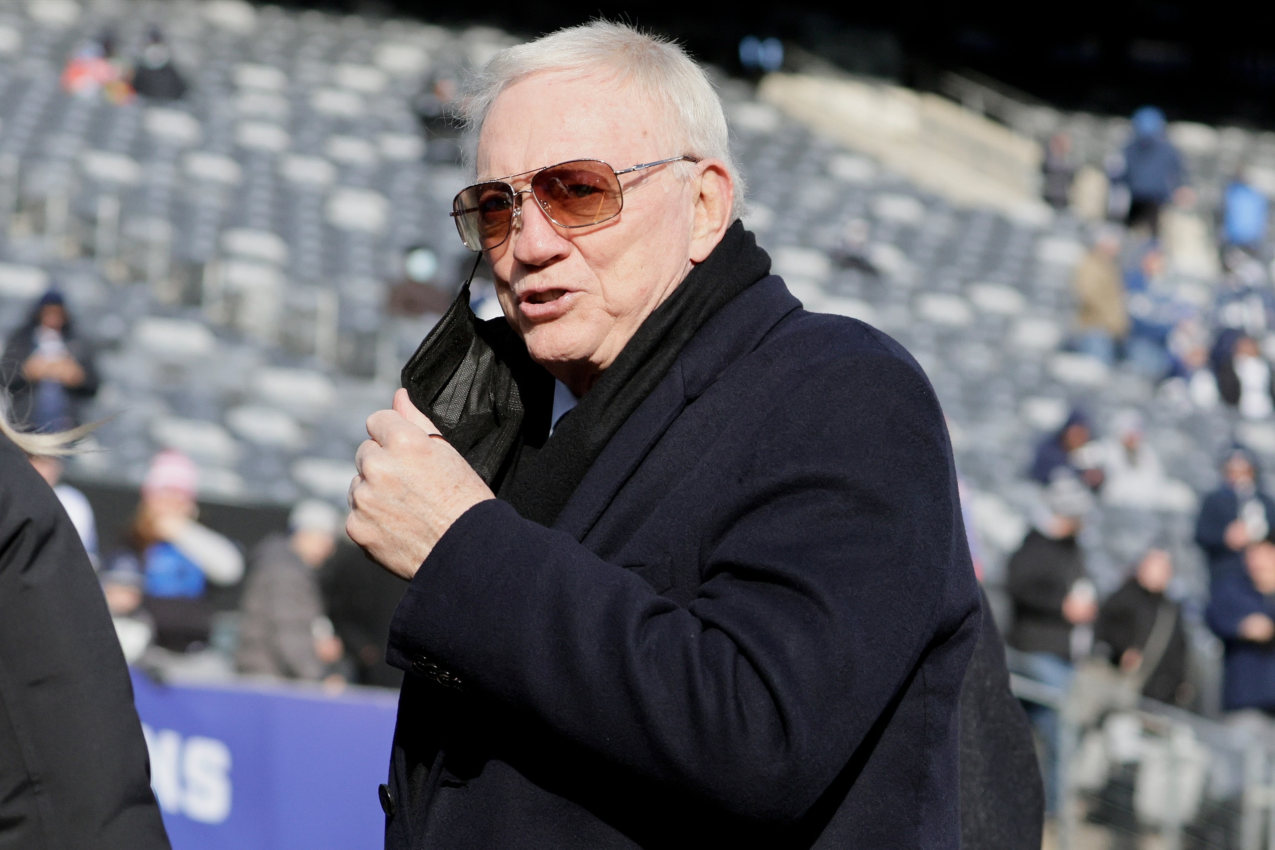 Dallas Cowboys owner Jerry Jones walks on the field before an NFL football game between the New York Giants and the Dallas Cowboys, Sunday, Dec. 19, 2021, in East Rutherford, N.J. (AP Photo/Corey Sipkin)