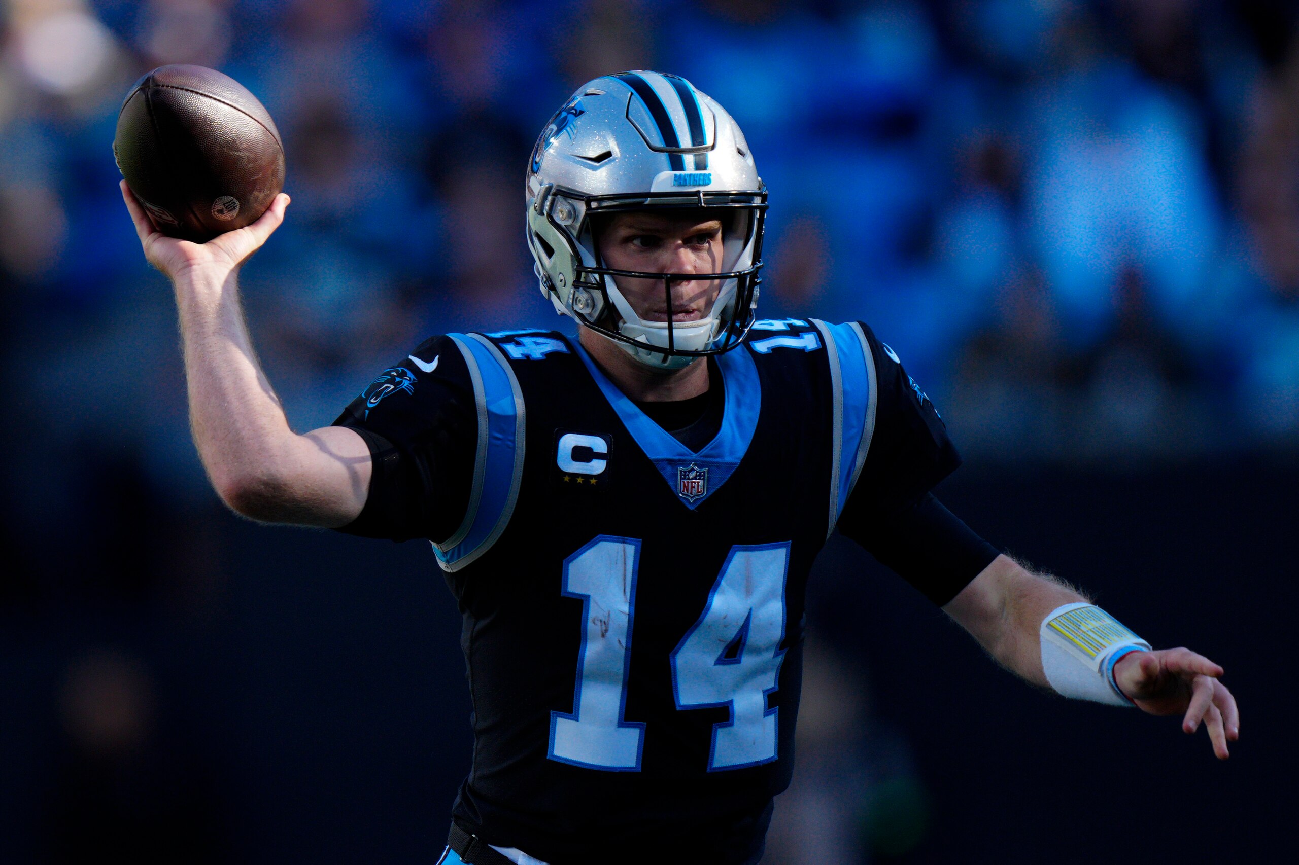 Carolina Panthers quarterback Sam Darnold throws an interception against the New England Patriots during the second half of an NFL football game Sunday, Nov. 7, 2021, in Charlotte, N.C. (AP Photo/Jacob Kupferman)