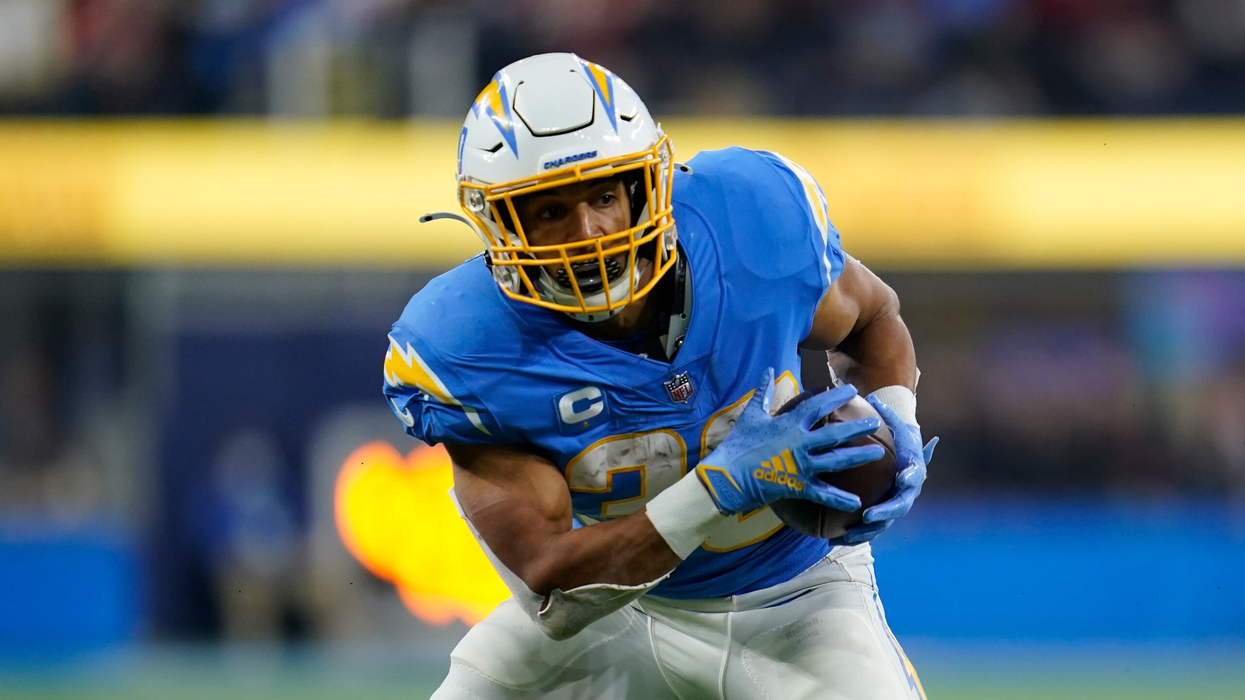 Los Angeles Chargers running back Austin Ekeler (30) runs the ball during an NFL football game against the Kansas City Chiefs Friday, Dec. 17, 2021, in Inglewood, Calif. (AP Photo/Ashley Landis)