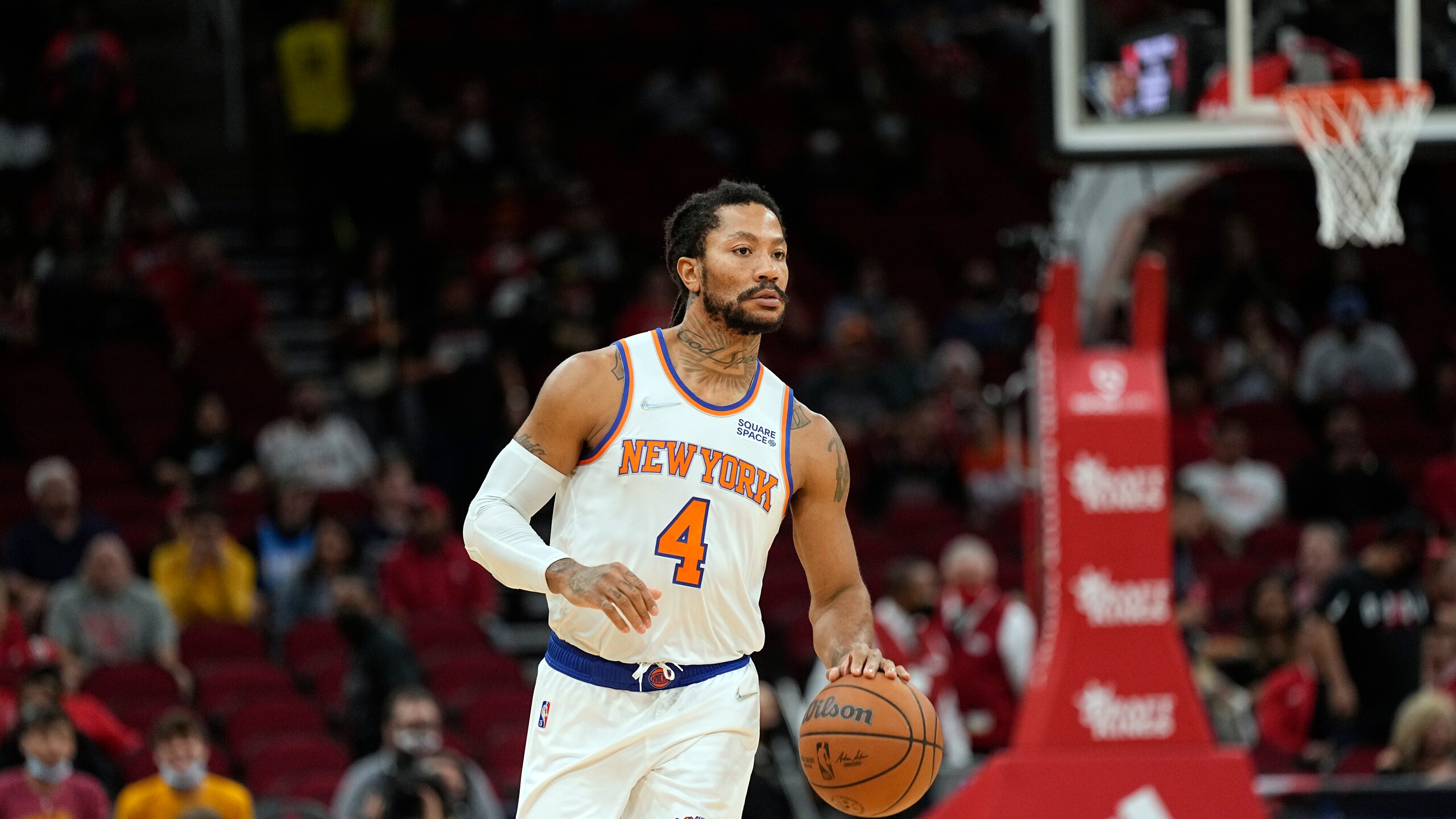 New York Knicks' Derrick Rose brings the ball up the court against the Houston Rockets during the first half of an NBA basketball game Thursday, Dec. 16, 2021, in Houston. (AP Photo/David J. Phillip)
