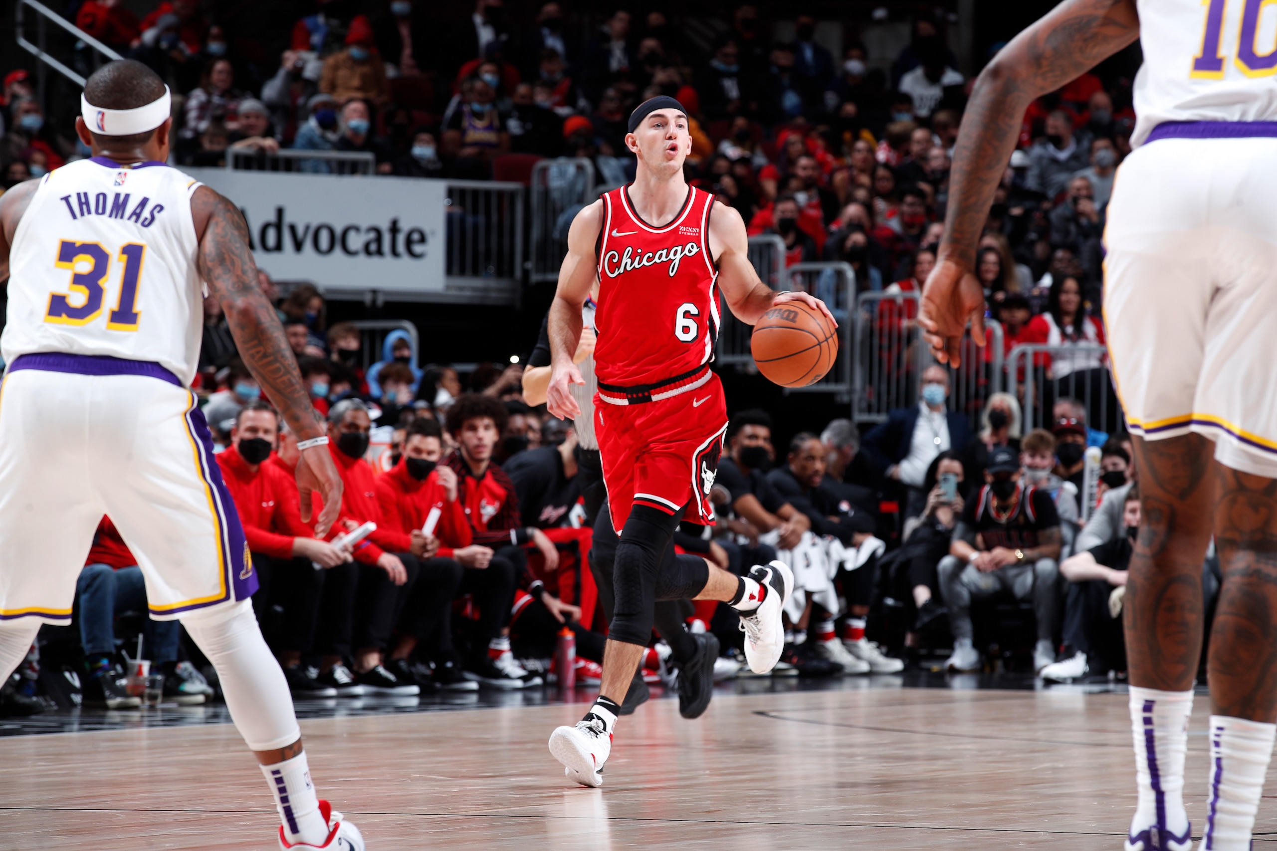 CHICAGO, IL - DECEMBER 19: Alex Caruso #6 of the Chicago Bulls dribbles the ball during the game against the Los Angeles Lakers on December 19, 2021 at United Center in Chicago, Illinois. NOTE TO USER: User expressly acknowledges and agrees that, by downloading and or using this photograph, User is consenting to the terms and conditions of the Getty Images License Agreement. Mandatory Copyright Notice: Copyright 2021 NBAE (Photo by Jeff Haynes/NBAE via Getty Images) CHICAGO, IL - DECEMBER 19: Alex Caruso #6 of the Chicago Bulls dribbles the ball during the game against the Los Angeles Lakers on December 19, 2021 at United Center in Chicago, Illinois. NOTE TO USER: User expressly acknowledges and agrees that, by downloading and or using this photograph, User is consenting to the terms and conditions of the Getty Images License Agreement. Mandatory Copyright Notice: Copyright 2021 NBAE (Photo by Jeff Haynes/NBAE via Getty Images)