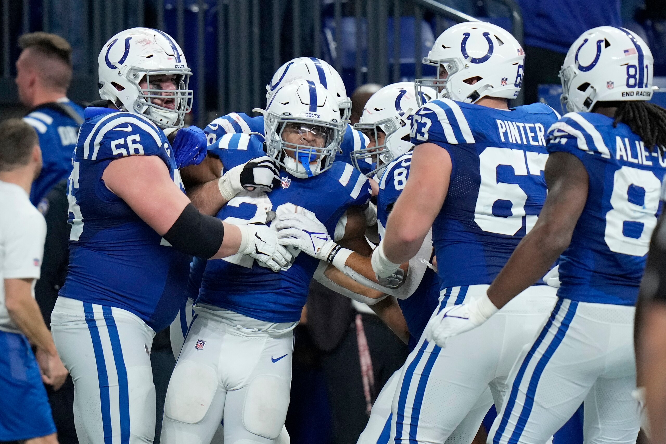 Indianapolis Colts running back Jonathan Taylor (28) celebrates with teammates after scoring after scoring on a 67-yard touchdown run during the second half of an NFL football game against the New England Patriots Saturday, Dec. 18, 2021, in Indianapolis. (AP Photo/AJ Mast) Indianapolis Colts running back Jonathan Taylor (28) celebrates with teammates after scoring after scoring on a 67-yard touchdown run during the second half of an NFL football game against the New England Patriots Saturday, Dec. 18, 2021, in Indianapolis. (AP Photo/AJ Mast)