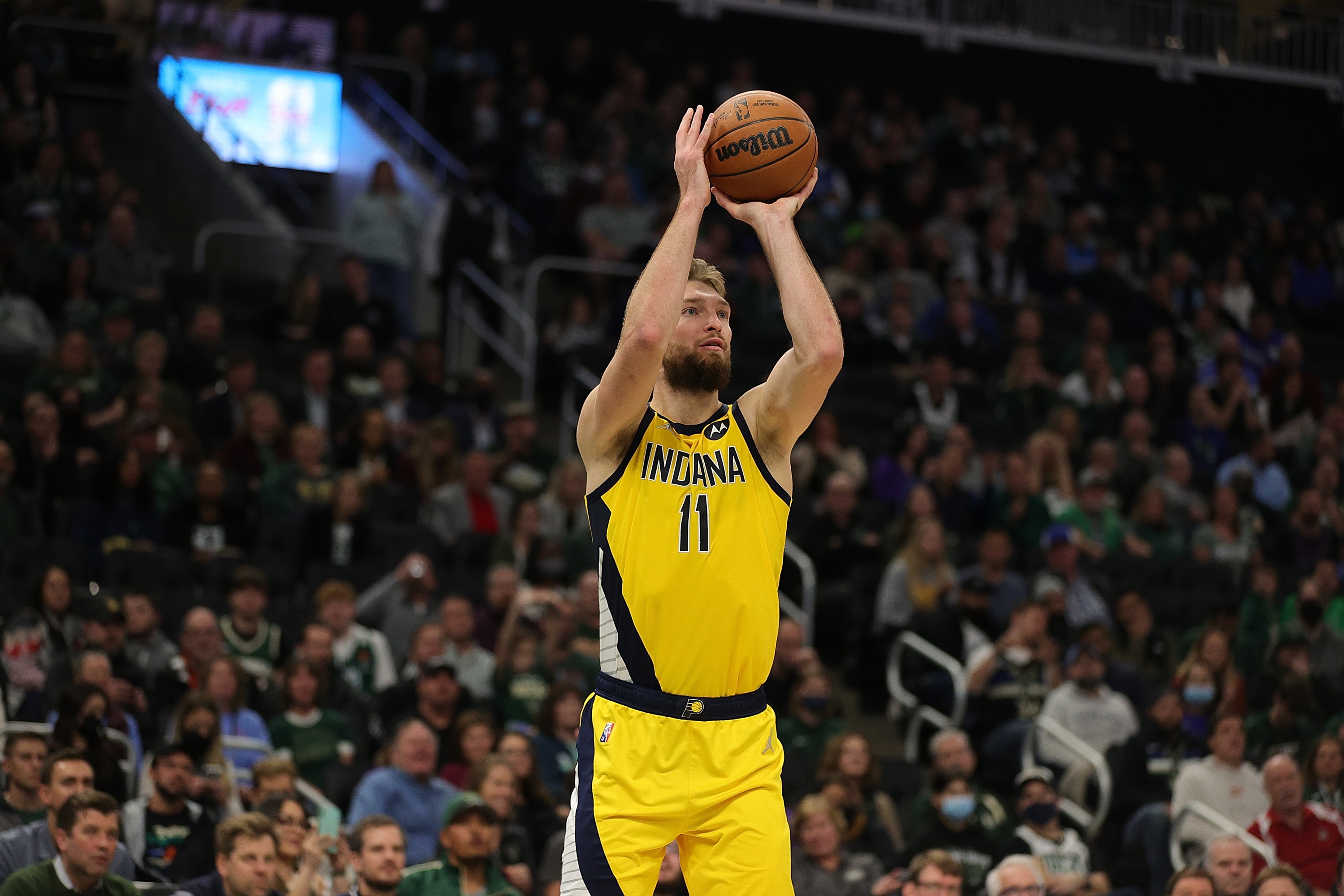 MILWAUKEE, WISCONSIN - DECEMBER 15: Domantas Sabonis #11 of the Indiana Pacers takes a shot during a game against the Milwaukee Bucks at Fiserv Forum on December 15, 2021 in Milwaukee, Wisconsin. NOTE TO USER: User expressly acknowledges and agrees that, by downloading and or using this photograph, User is consenting to the terms and conditions of the Getty Images License Agreement. (Photo by Stacy Revere/Getty Images)