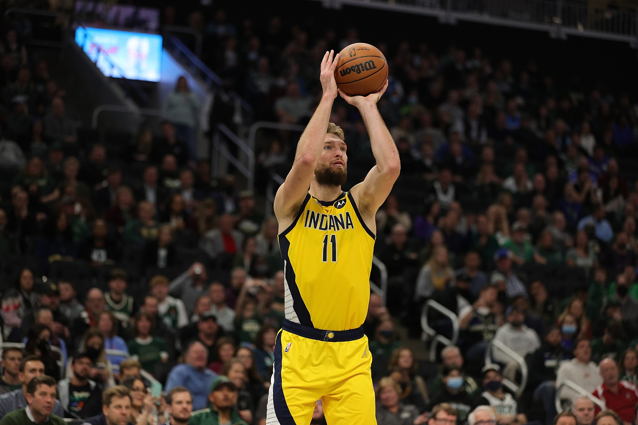 MILWAUKEE, WISCONSIN - DECEMBER 15: Domantas Sabonis #11 of the Indiana Pacers takes a shot during a game against the Milwaukee Bucks at Fiserv Forum on December 15, 2021 in Milwaukee, Wisconsin. NOTE TO USER: User expressly acknowledges and agrees that, by downloading and or using this photograph, User is consenting to the terms and conditions of the Getty Images License Agreement. (Photo by Stacy Revere/Getty Images)