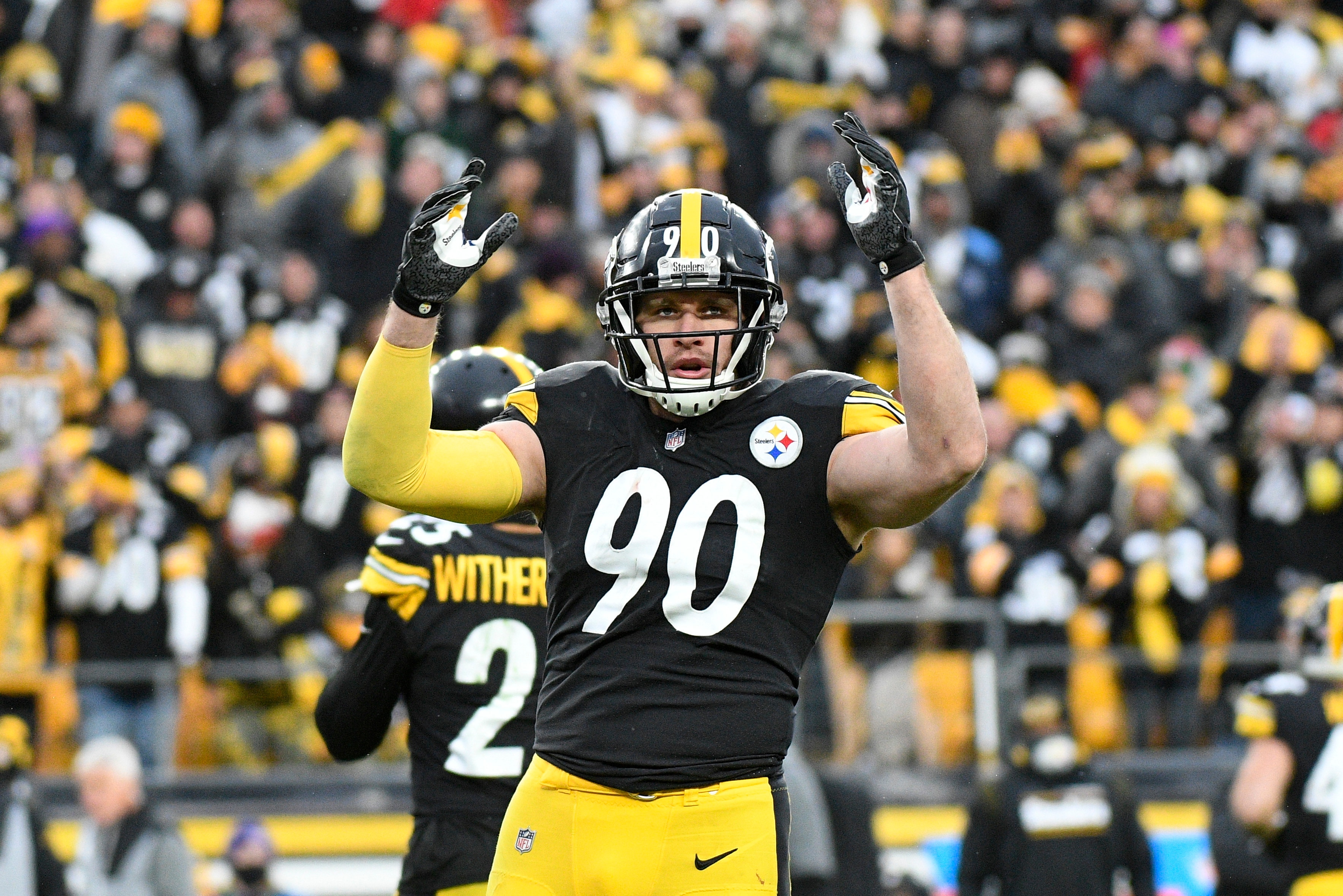 Pittsburgh Steelers outside linebacker T.J. Watt (90) plays against the Tennessee Titans during an NFL football game, Sunday, Dec. 19, 2021, in Pittsburgh. (AP Photo/Don Wright)