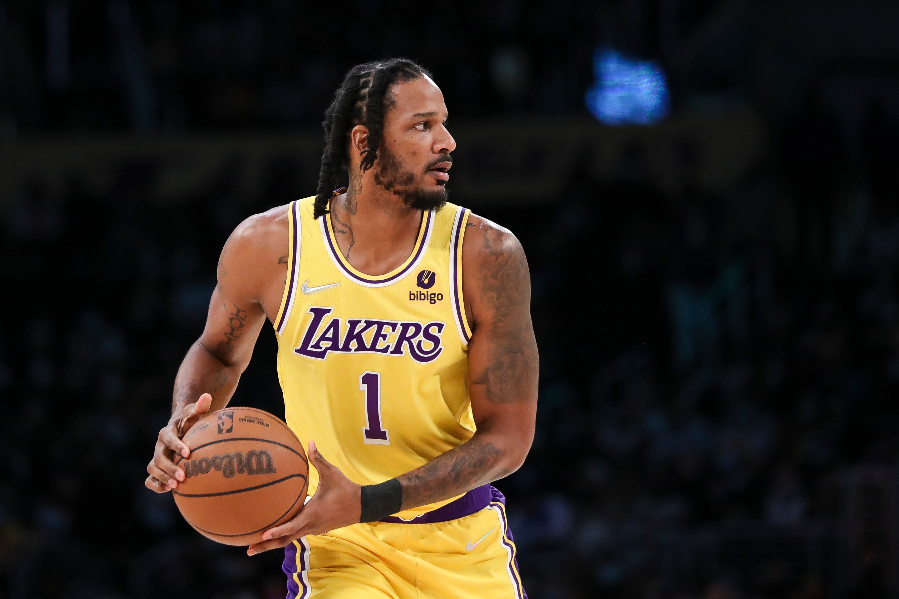 LOS ANGELES, CALIFORNIA - DECEMBER 21: Trevor Ariza #1 of the Los Angeles Lakers looks to pass the ball during the first half against the Phoenix Suns at Staples Center on December 21, 2021 in Los Angeles, California. NOTE TO USER: User expressly acknowledges and agrees that, by downloading and/or using this photograph, User is consenting to the terms and conditions of the Getty Images License Agreement. (Photo by Meg Oliphant/Getty Images )