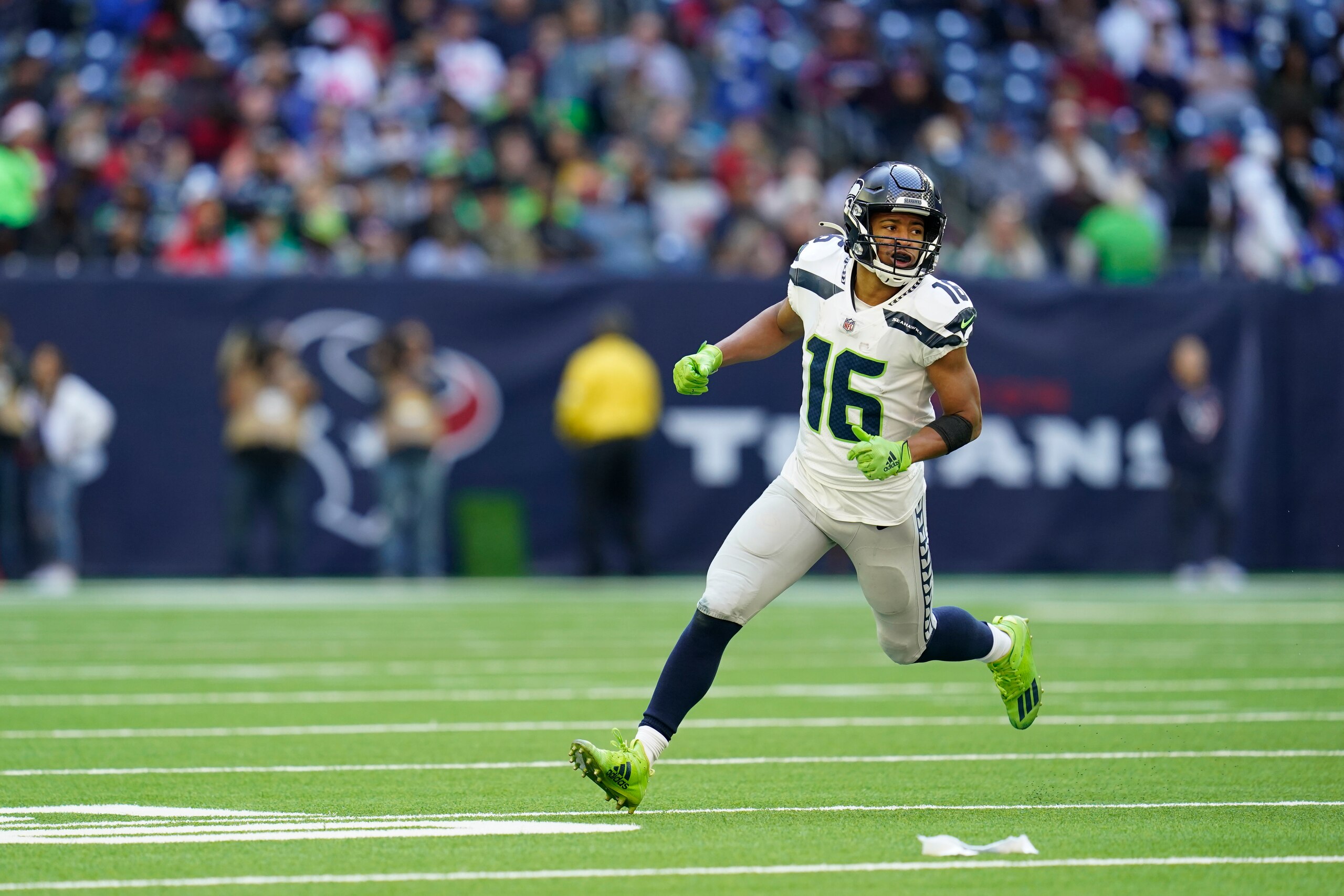 Seattle Seahawks wide receiver Tyler Lockett (16) runs a pass route during an NFL football game against the Houston Texans, Sunday, Dec. 12, 2021, in Houston. (AP Photo/Matt Patterson)