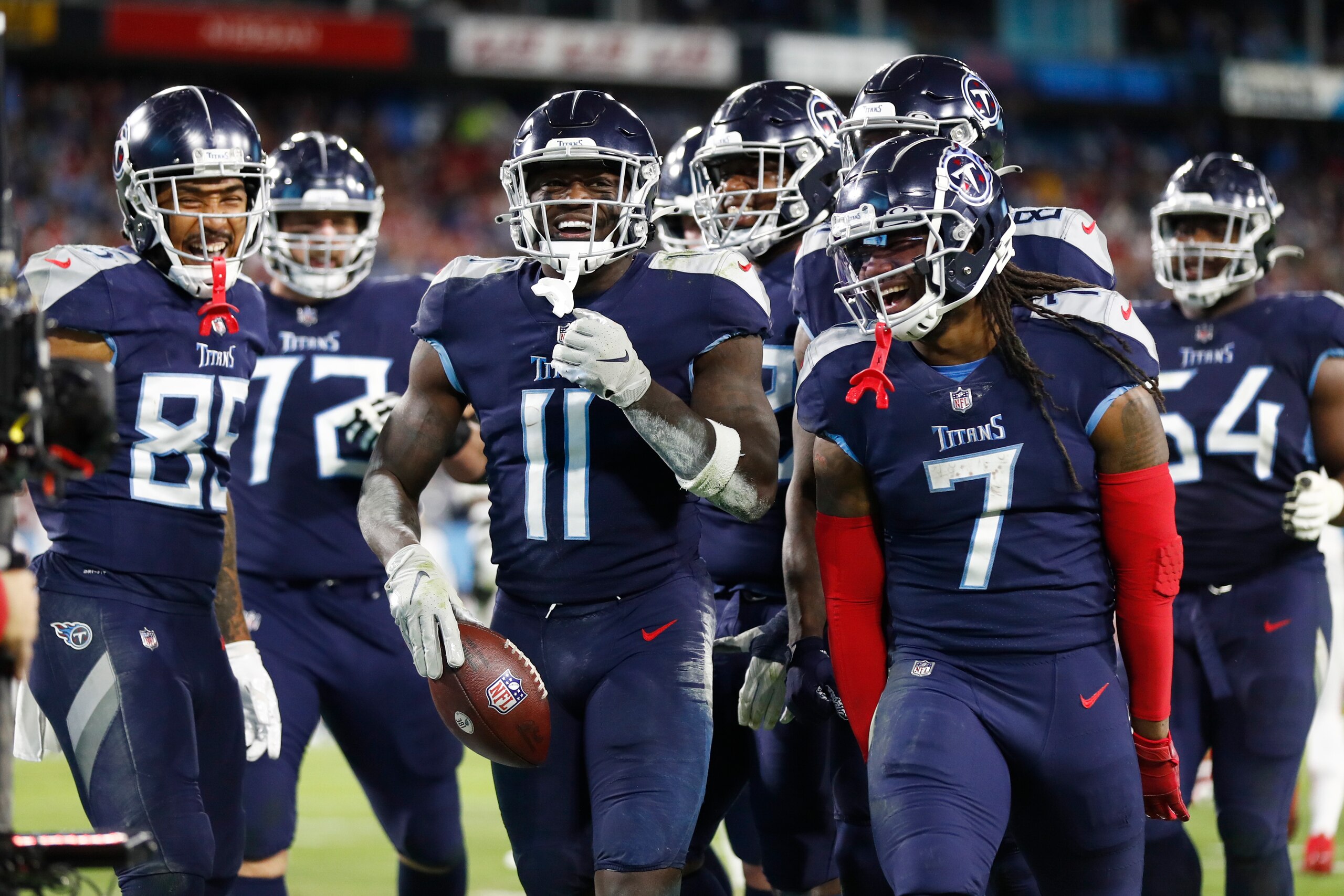 Tennessee Titans wide receiver A.J. Brown (11) celebrates after scoring a touchdown against the San Francisco 49ers in the second half of an NFL football game Thursday, Dec. 23, 2021, in Nashville, Tenn. (AP Photo/Wade Payne)