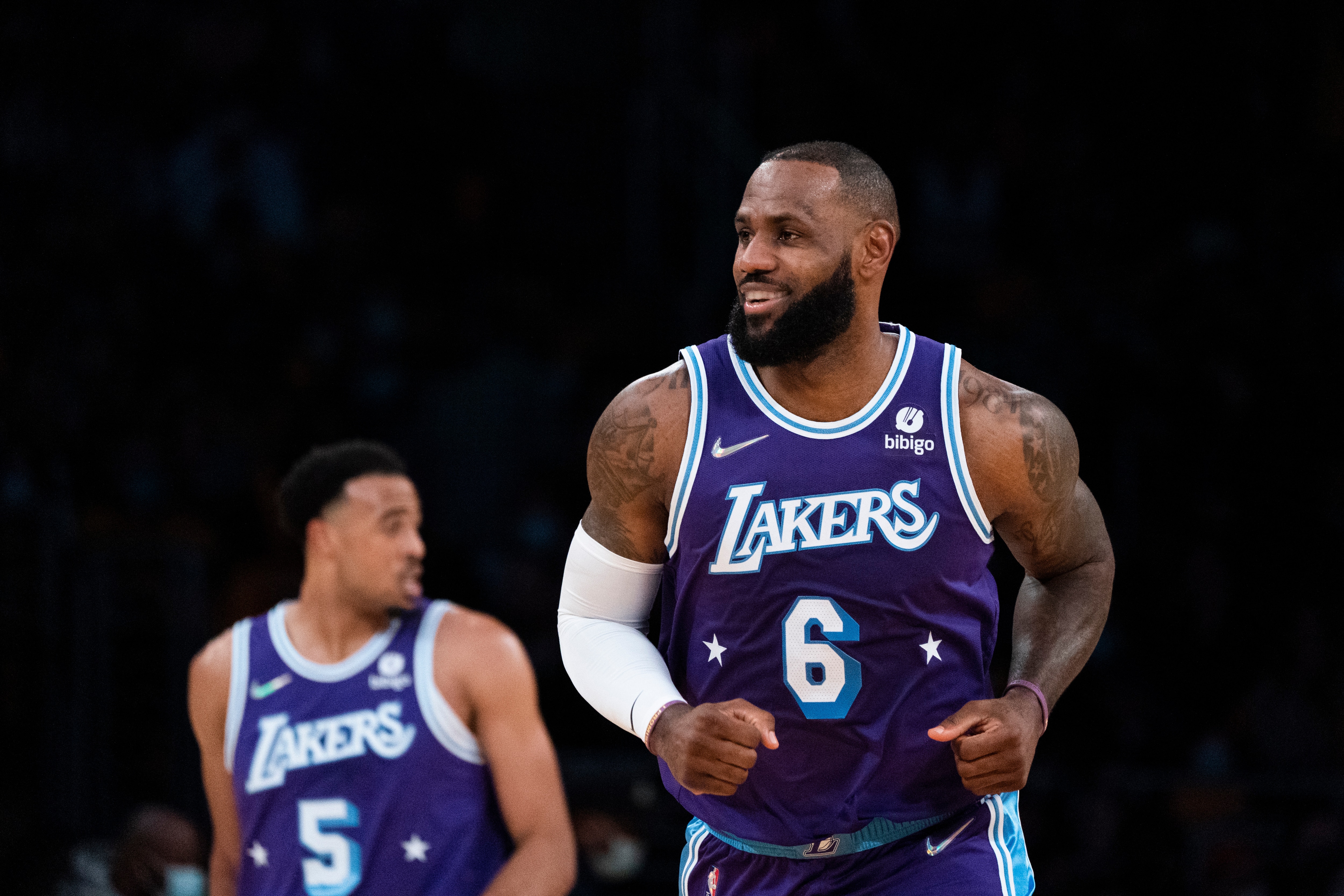 Los Angeles Lakers' LeBron James smiles as he makes his way down the court during first half of an NBA basketball game against the San Antonio Spurs Thursday, Dec. 23, 2021, in Los Angeles. (AP Photo/Jae C. Hong) Los Angeles Lakers' LeBron James smiles as he makes his way down the court during first half of an NBA basketball game against the San Antonio Spurs Thursday, Dec. 23, 2021, in Los Angeles. (AP Photo/Jae C. Hong)