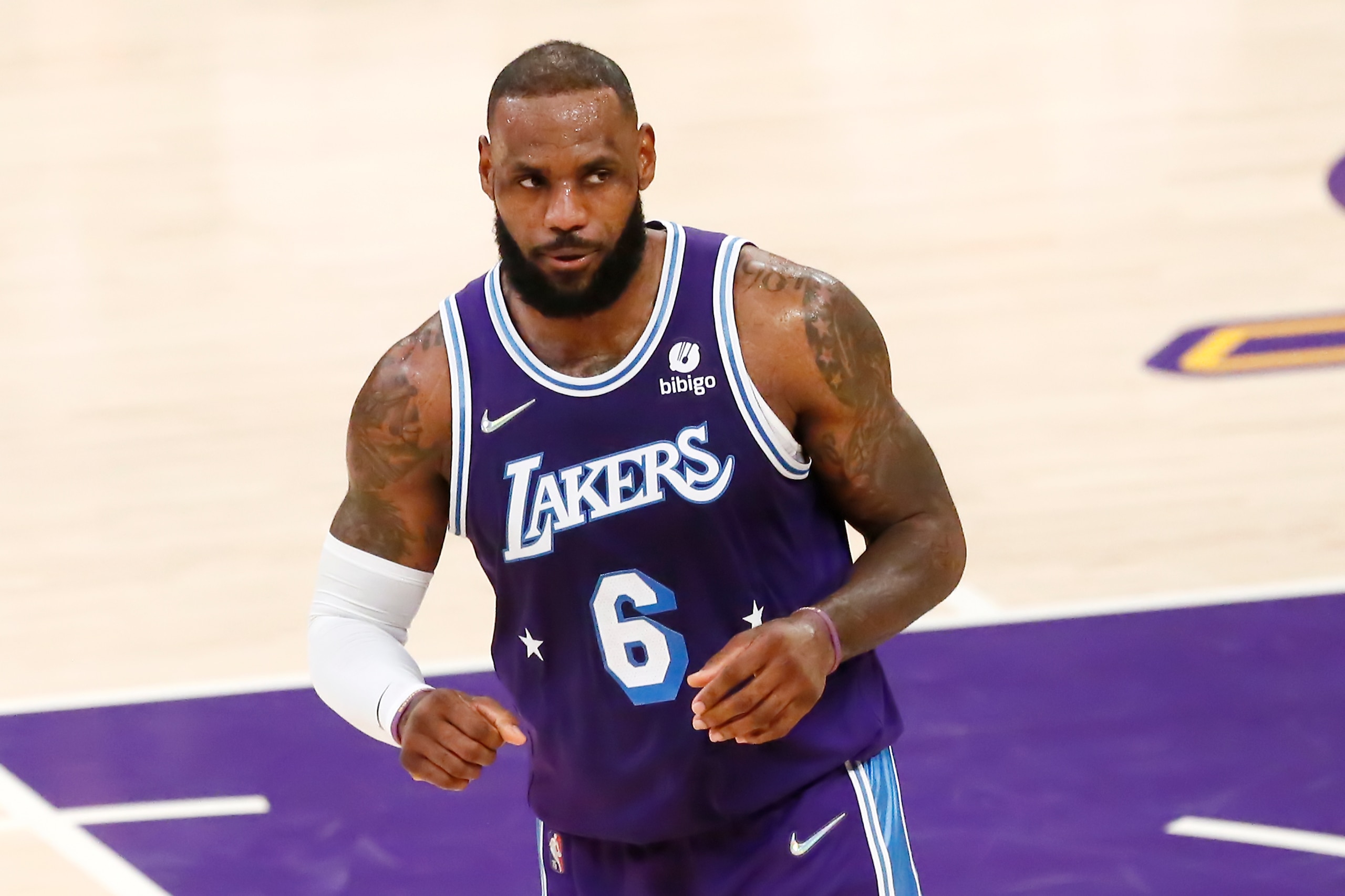 LOS ANGELES, CA - DECEMBER 23: LeBron James #6 of the Los Angeles Lakers looks on during a game at the STAPLES Center on December 23, 2021 in Los Angeles, California. NOTE TO USER: User expressly acknowledges and agrees that, by downloading and or using this photograph, User is consenting to the terms and conditions of the Getty Images License Agreement. Mandatory Credit: 2021 NBAE (Photo by Chris Elise/NBAE via Getty Images)