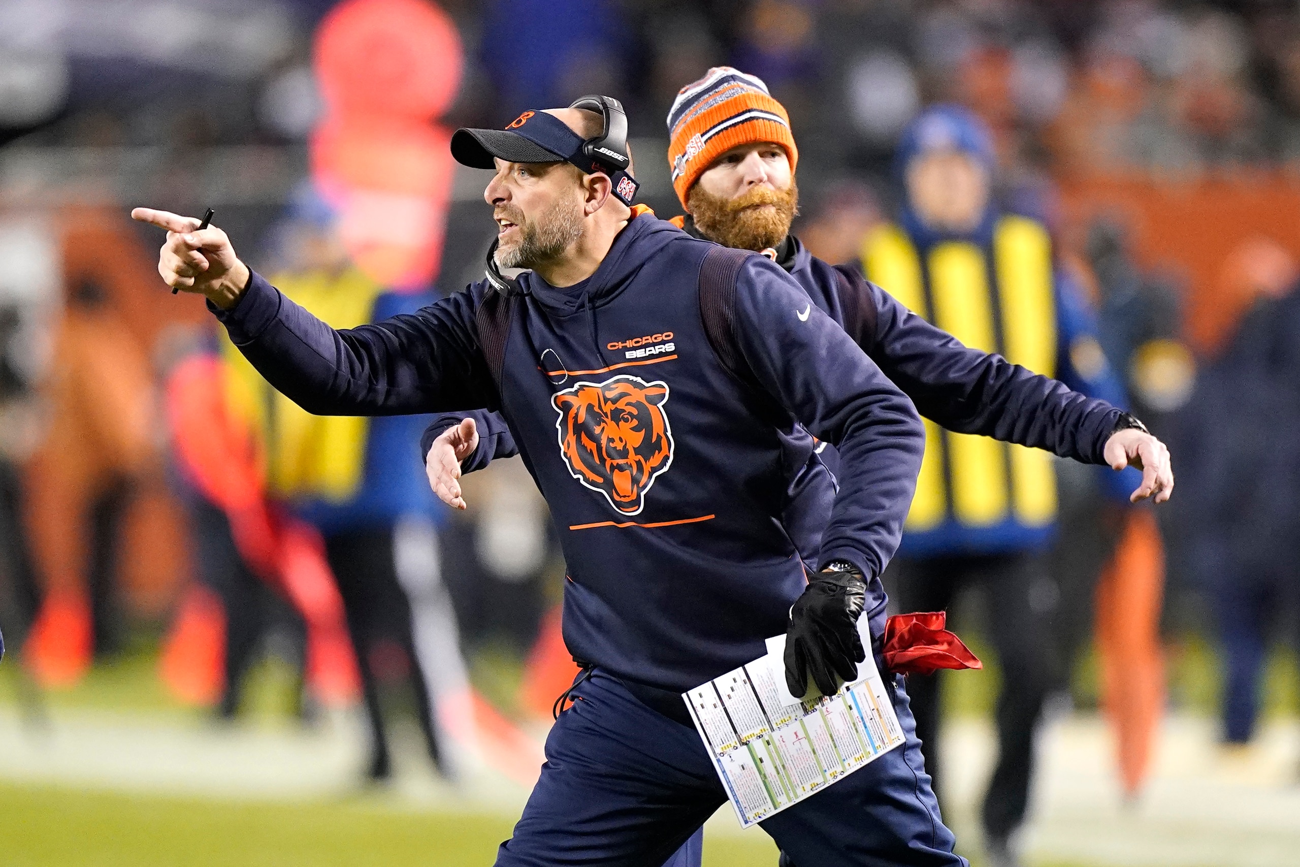 Chicago Bears head coach Matt Nagy points out onto the field during the second half of an NFL football game against the Minnesota Vikings Monday, Dec. 20, 2021, in Chicago. (AP Photo/Nam Y. Huh)