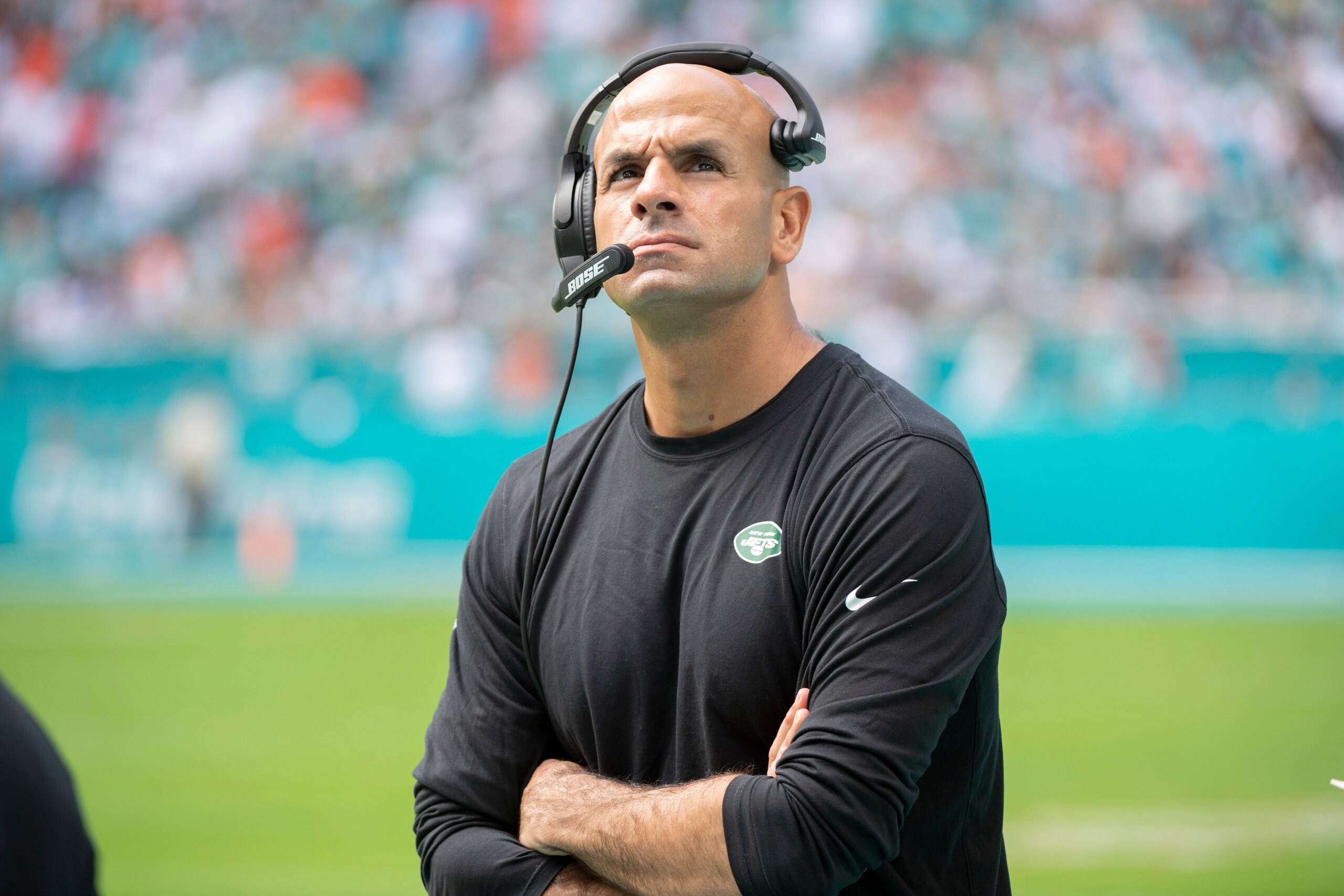 New York Jets head coach Robert Saleh watches a replay on screen on the sidelines during an NFL football game against the Miami Dolphins, Sunday, Dec. 19, 2021, in Miami Gardens, Fla. (AP Photo/Doug Murray)