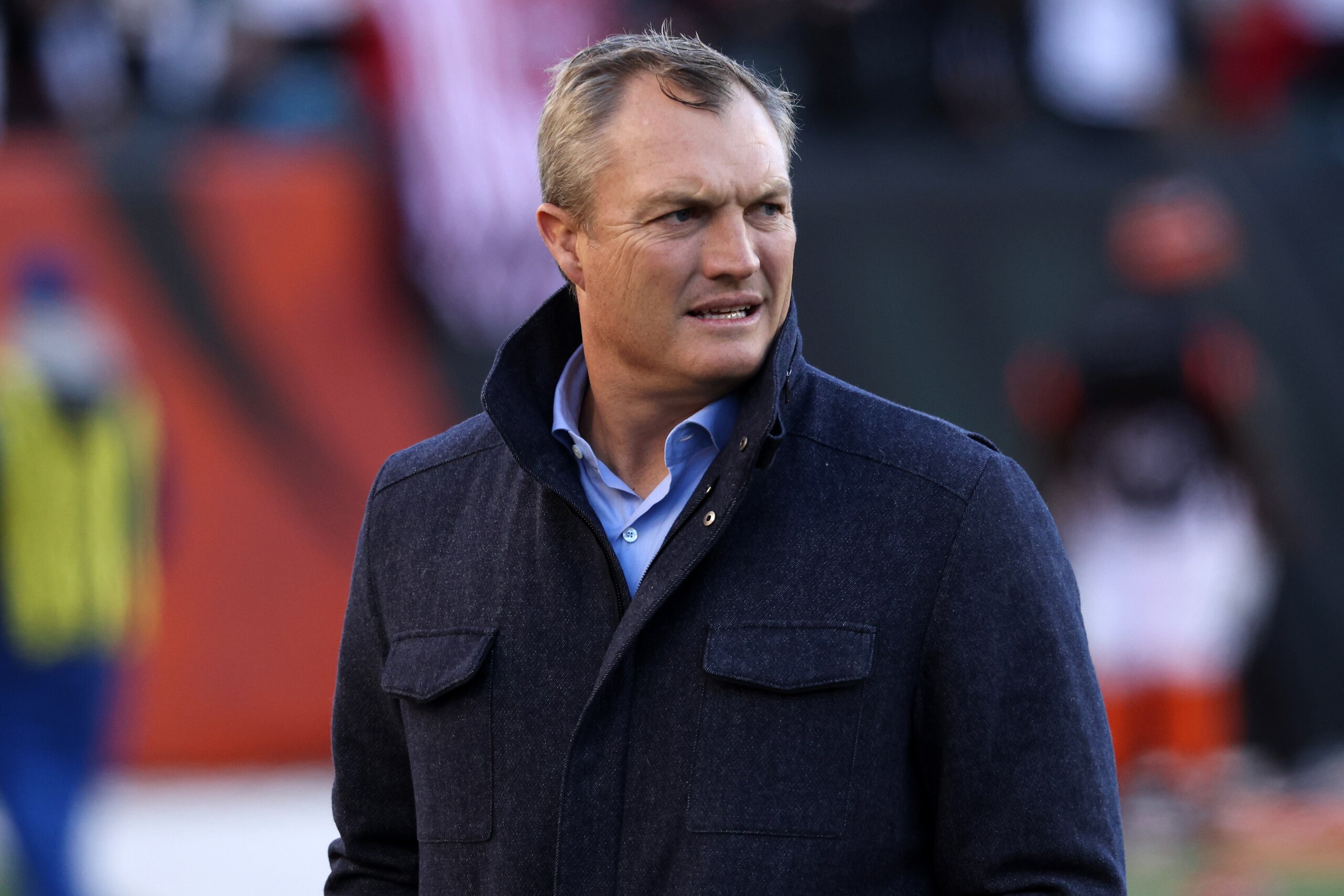 CINCINNATI, OHIO - DECEMBER 12: General Manager John Lynch of the San Francisco 49ers looks on during warm up before the game against the Cincinnati Bengals at Paul Brown Stadium on December 12, 2021 in Cincinnati, Ohio. (Photo by Dylan Buell/Getty Images)