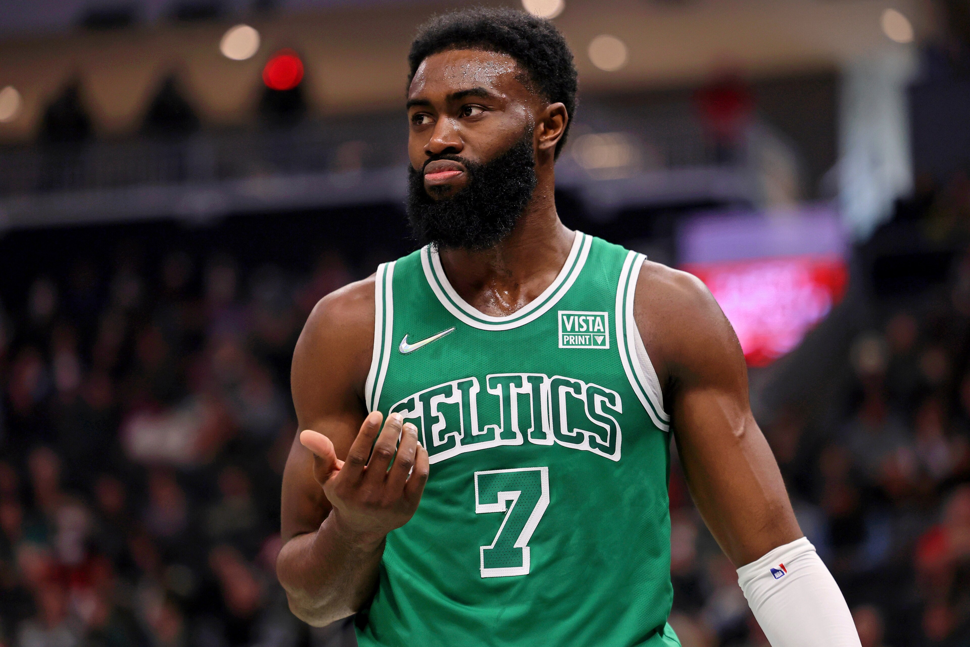 Boston Celtics guard Jaylen Brown (7) reacts after chipping his tooth on a play against the Milwaukee Bucks during the first half of an NBA basketball game Saturday, Dec. 25, 2021, in Milwaukee. (AP Photo/Jon Durr) Boston Celtics guard Jaylen Brown (7) reacts after chipping his tooth on a play against the Milwaukee Bucks during the first half of an NBA basketball game Saturday, Dec. 25, 2021, in Milwaukee. (AP Photo/Jon Durr)
