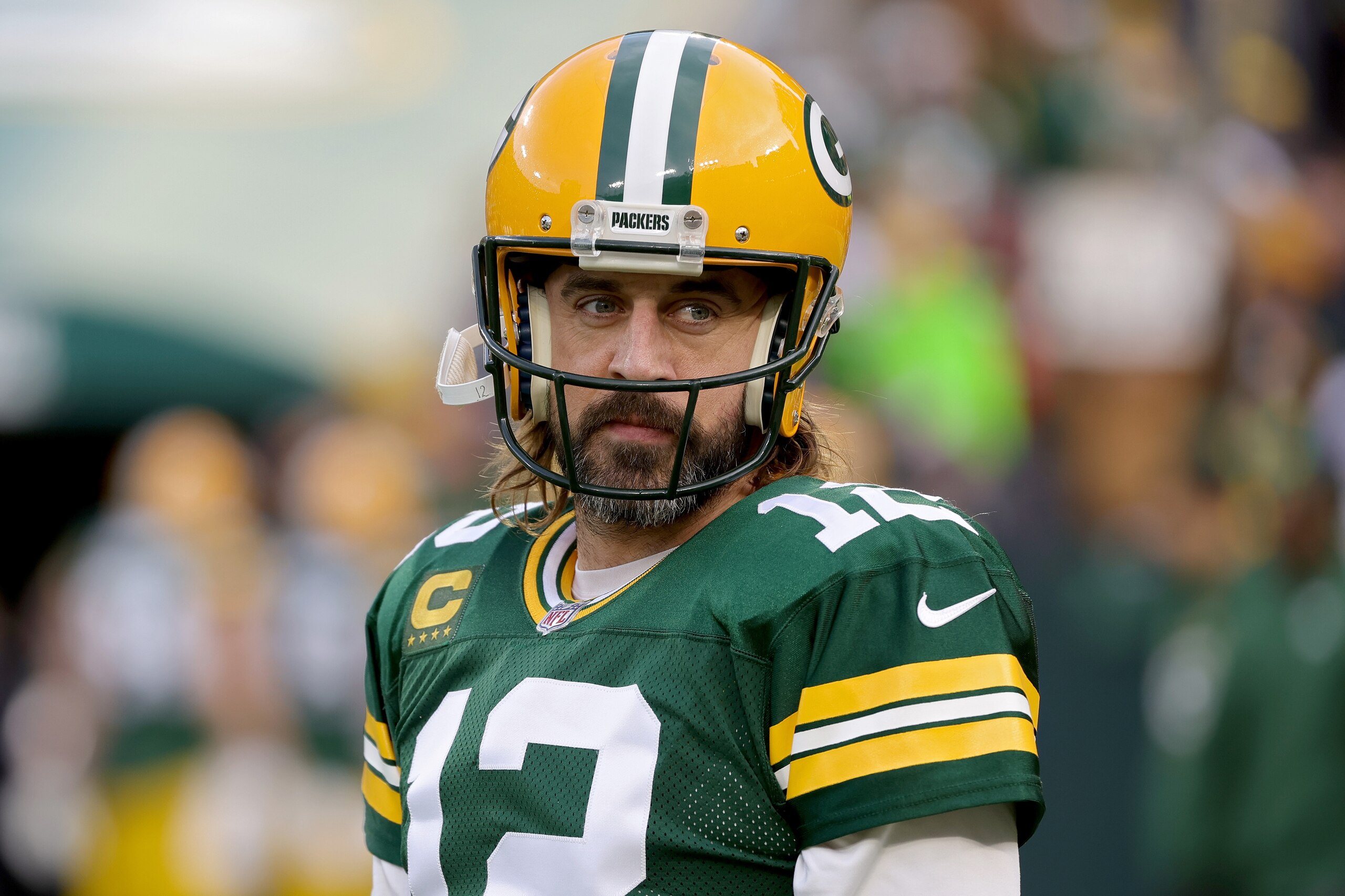 GREEN BAY, WISCONSIN - DECEMBER 25: Aaron Rodgers #12 of the Green Bay Packers looks on before the game against the Cleveland Browns at Lambeau Field on December 25, 2021 in Green Bay, Wisconsin. (Photo by Stacy Revere/Getty Images)