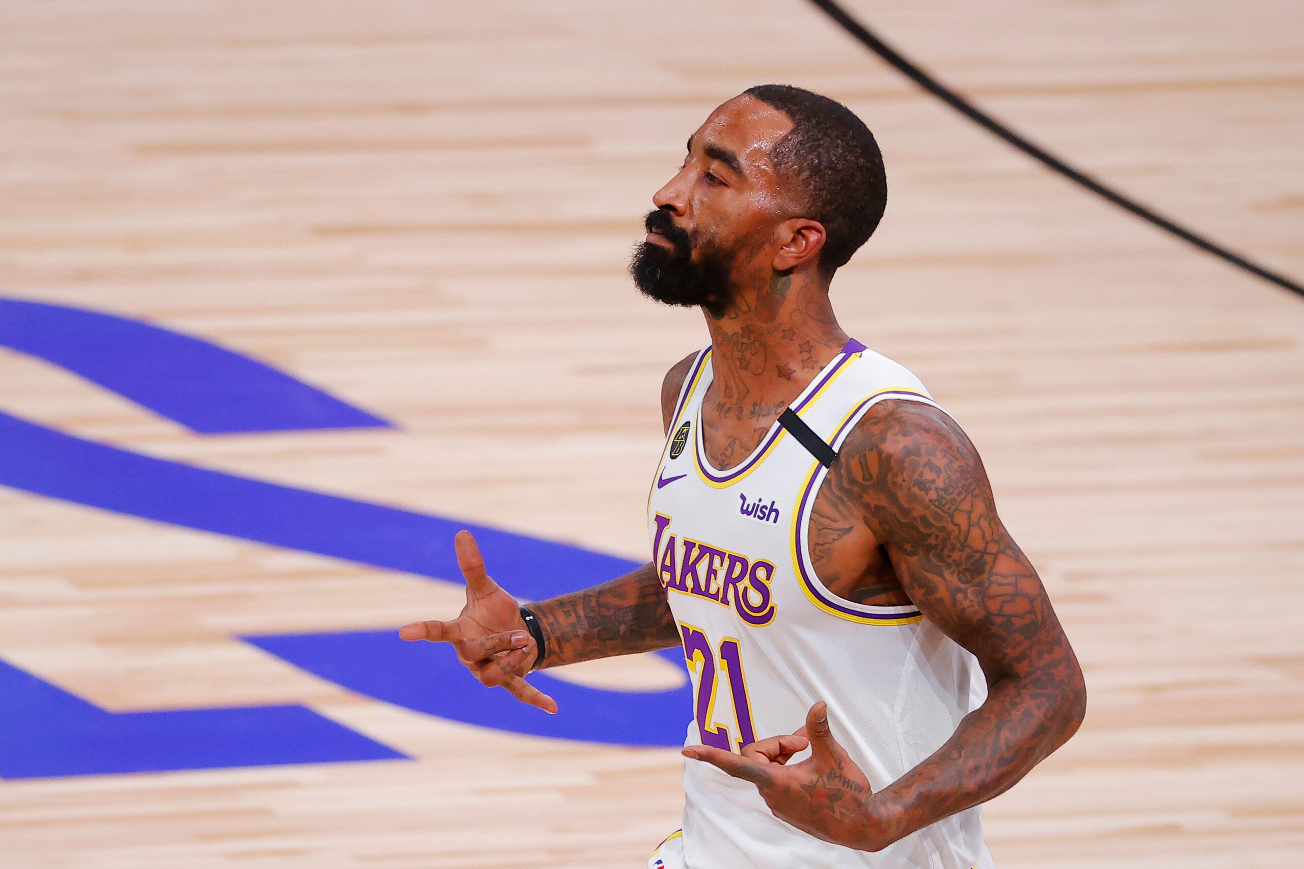 LAKE BUENA VISTA, FLORIDA - OCTOBER 04: JR Smith #21 of the Los Angeles Lakers reacts after a three point basket during the first half against the Miami Heat in Game Three of the 2020 NBA Finals at AdventHealth Arena at ESPN Wide World Of Sports Complex on October 04, 2020 in Lake Buena Vista, Florida. NOTE TO USER: User expressly acknowledges and agrees that, by downloading and or using this photograph, User is consenting to the terms and conditions of the Getty Images License Agreement. (Photo by Kevin C. Cox/Getty Images) LAKE BUENA VISTA, FLORIDA - OCTOBER 04: JR Smith #21 of the Los Angeles Lakers reacts after a three point basket during the first half against the Miami Heat in Game Three of the 2020 NBA Finals at AdventHealth Arena at ESPN Wide World Of Sports Complex on October 04, 2020 in Lake Buena Vista, Florida. NOTE TO USER: User expressly acknowledges and agrees that, by downloading and or using this photograph, User is consenting to the terms and conditions of the Getty Images License Agreement. (Photo by Kevin C. Cox/Getty Images)