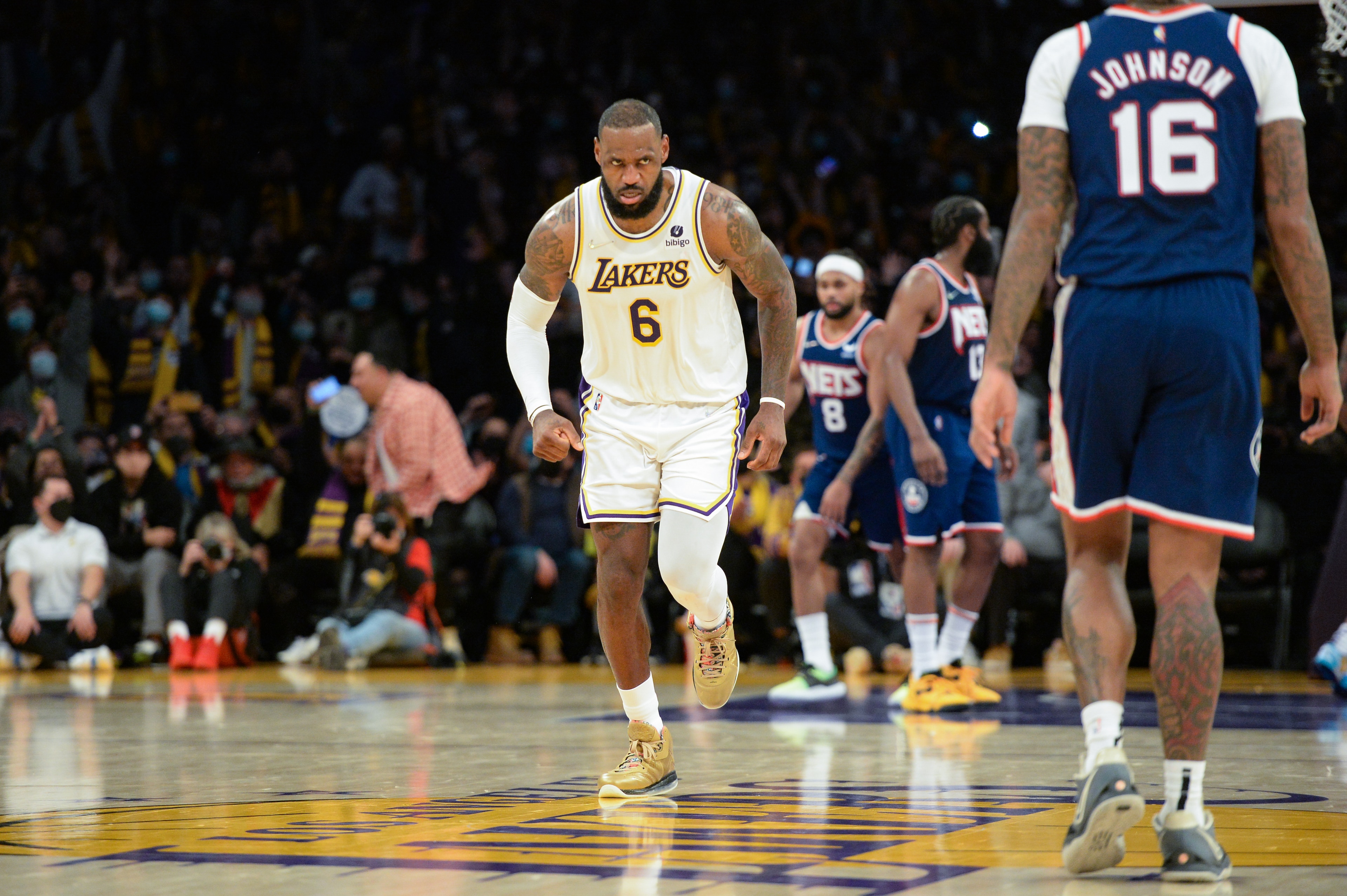 LOS ANGELES, CA - DECEMBER 25: LeBron James #6 of the Los Angeles Lakers reacts to a play during the game against the Brooklyn Nets on December 25, 2021 at Crypto.Com Arena in Los Angeles, California. NOTE TO USER: User expressly acknowledges and agrees that, by downloading and/or using this Photograph, user is consenting to the terms and conditions of the Getty Images License Agreement. Mandatory Copyright Notice: Copyright 2021 NBAE (Photo by Andrew D. Bernstein/NBAE via Getty Images)
