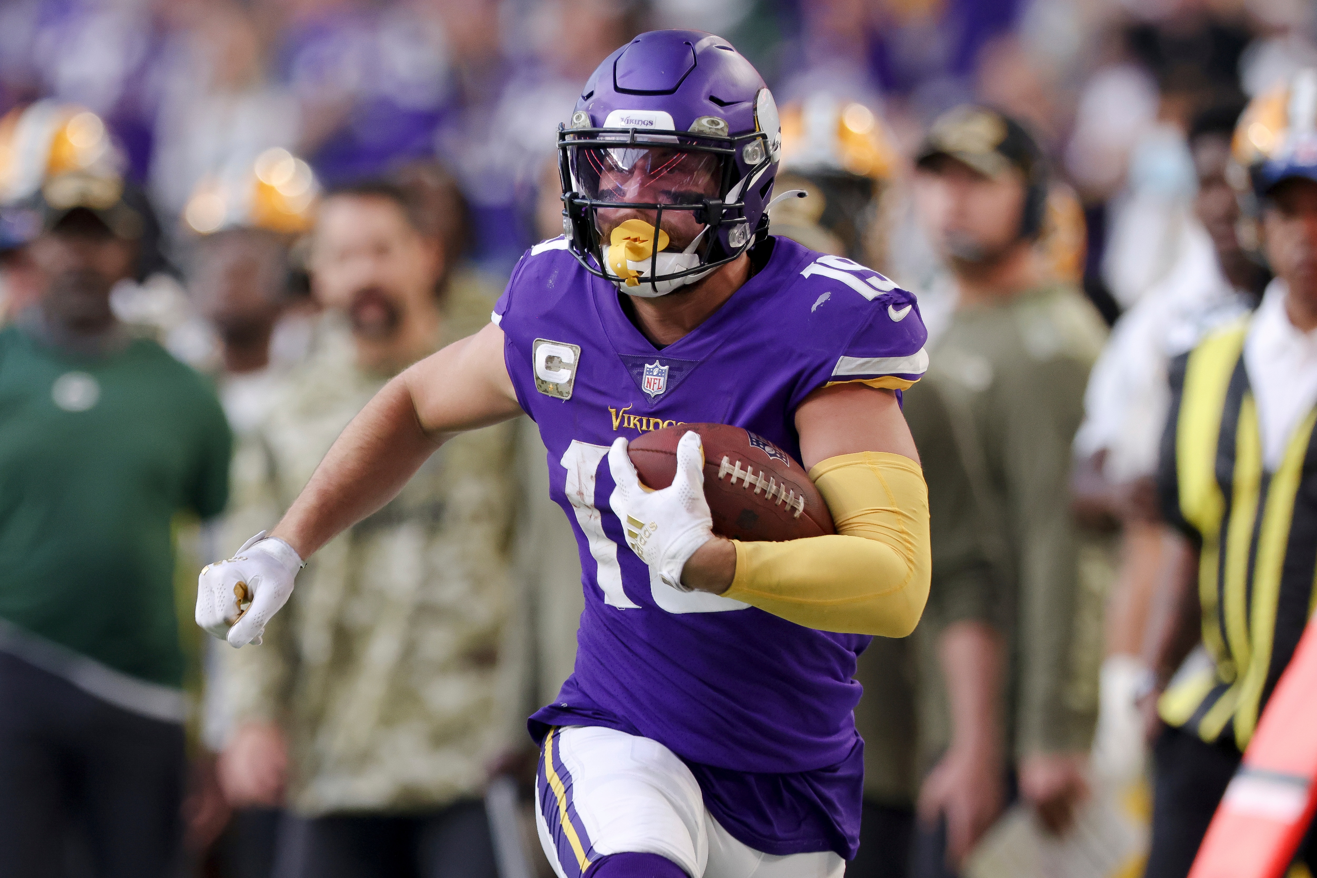 Minnesota Vikings wide receiver Adam Thielen (19) carries the ball during the second half of an NFL football game against the Green Bay Packers, Sunday, Nov. 21, 2021 in Minneapolis. Minnesota won 34-31. (AP Photo/Stacy Bengs)