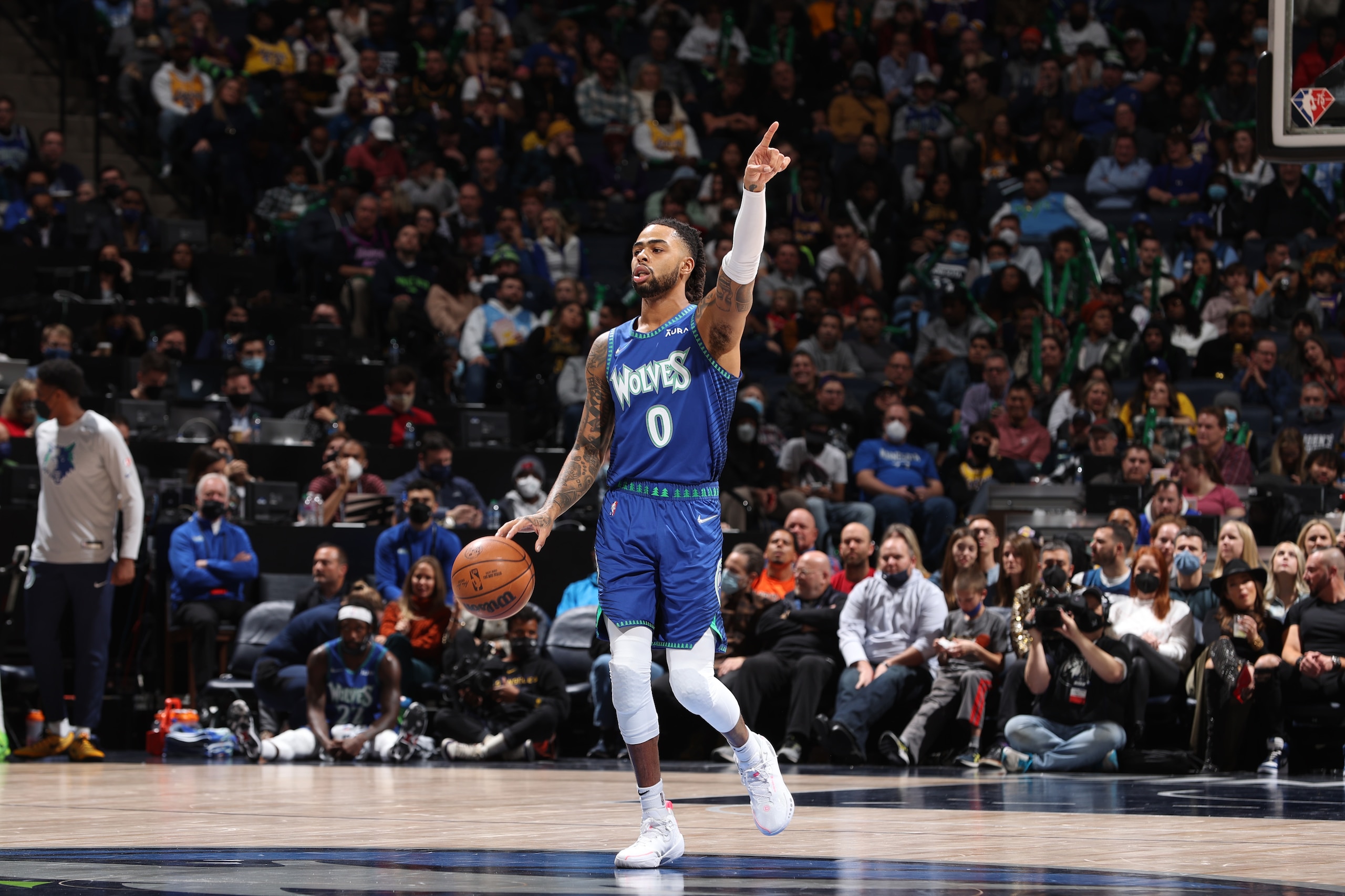 MINNEAPOLIS, MN -  DECEMBER 17: D'Angelo Russell #0 of the Minnesota Timberwolves dribbles the ball during the game against the Los Angeles Lakers on December 17, 2021 at Target Center in Minneapolis, Minnesota. NOTE TO USER: User expressly acknowledges and agrees that, by downloading and or using this Photograph, user is consenting to the terms and conditions of the Getty Images License Agreement. Mandatory Copyright Notice: Copyright 2021 NBAE (Photo by David Sherman/NBAE via Getty Images)