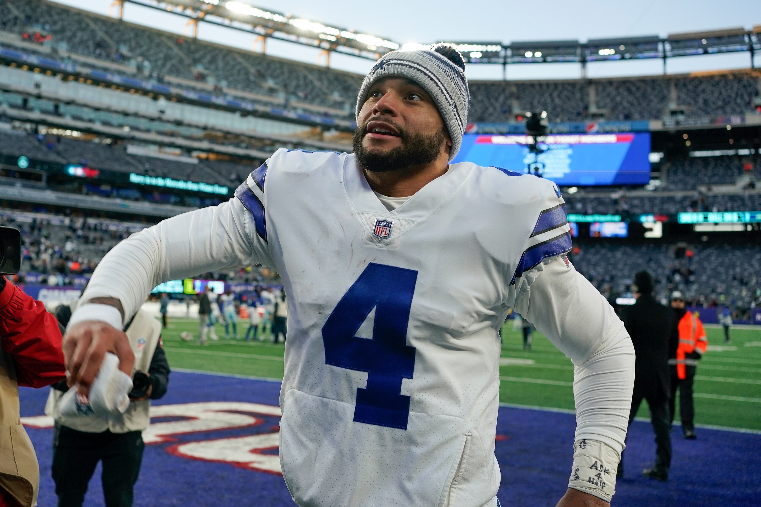 Dallas Cowboys quarterback Dak Prescott (4) walks off the field after an NFL football game against the New York Giants, Sunday, Dec. 19, 2021, in East Rutherford, N.J. (AP Photo/Seth Wenig) Dallas Cowboys quarterback Dak Prescott (4) walks off the field after an NFL football game against the New York Giants, Sunday, Dec. 19, 2021, in East Rutherford, N.J. (AP Photo/Seth Wenig)