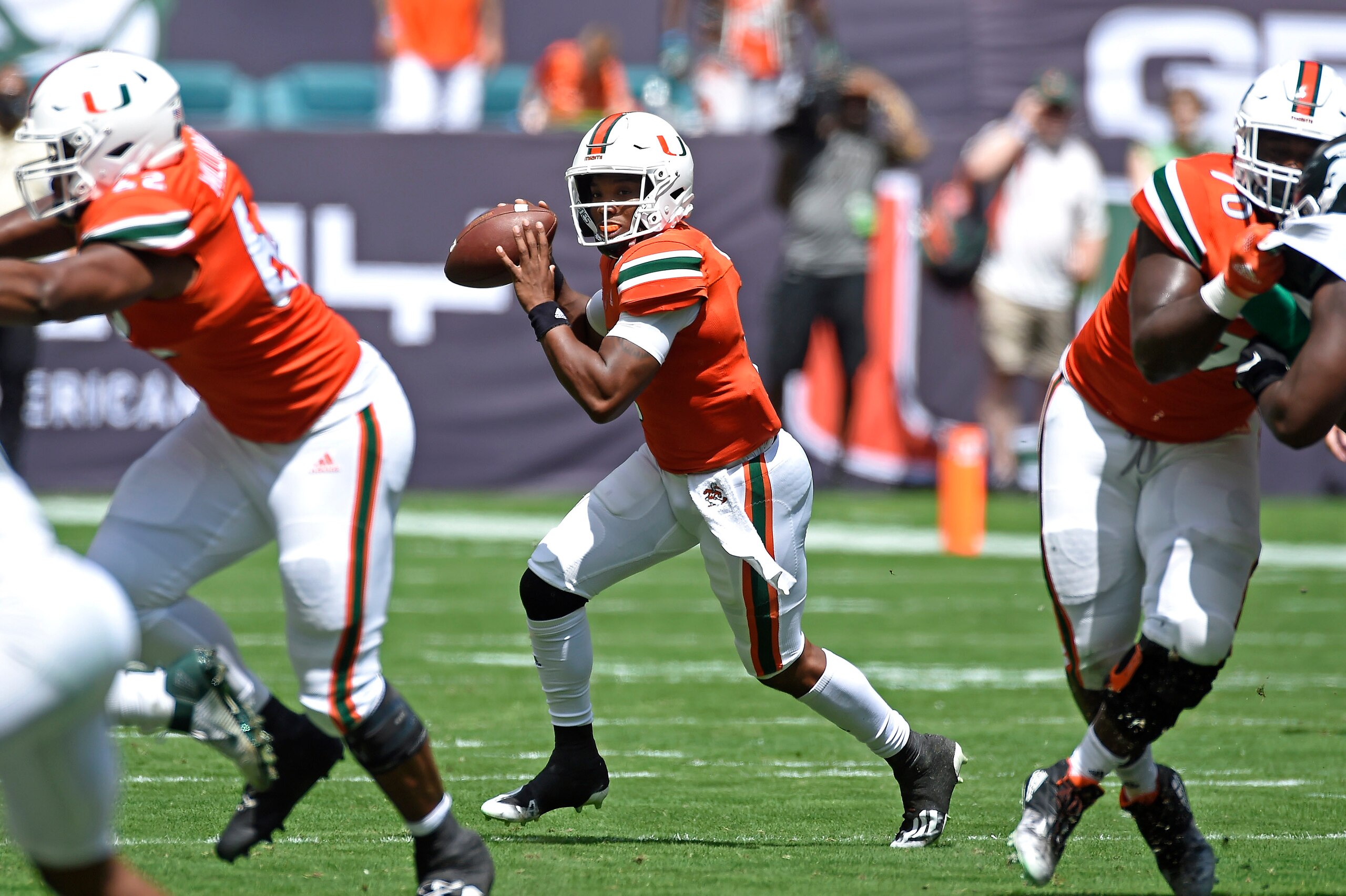 MIAMI GARDENS, FL - SEPTEMBER 18:  Miami quarterback D'Eriq King (1) looks for a receiver downfield in the first quarter as the University of Miami Hurricanes faced the Michigan State University Spartans on September 18, 2021, at Hard Rock Stadium in Miami Gardens, Florida. (Photo by Samuel Lewis/Icon Sportswire via Getty Images)