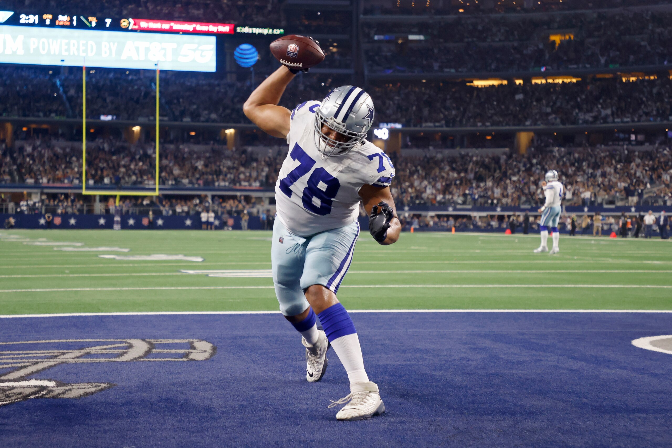 Dallas Cowboys offensive tackle Terence Steele (78) celebrates after catching a touchdown pass in the first half of an NFL football game against the Washington Football Team in Arlington, Texas, Sunday, Dec. 26, 2021. (AP Photo/Michael Ainsworth)