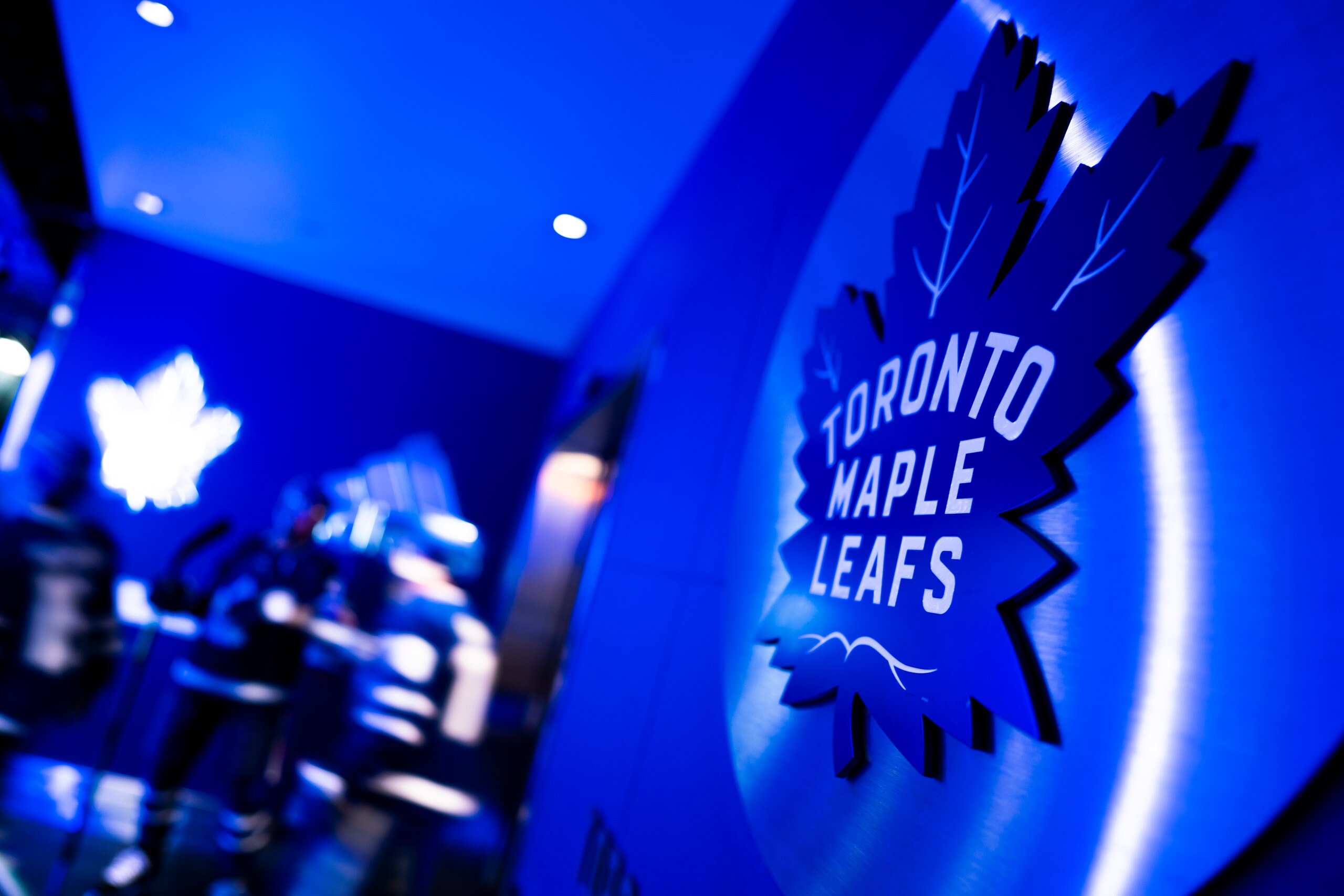 TORONTO, ON - DECEMBER 11: Toronto Maple Leafs players exit the locker room behind the Maple Leafs logo before playing the Chicago Blackhawks at the Scotiabank Arena on December 11, 2021 in Toronto, Ontario, Canada. (Photo by Mark Blinch/NHLI via Getty Images)
