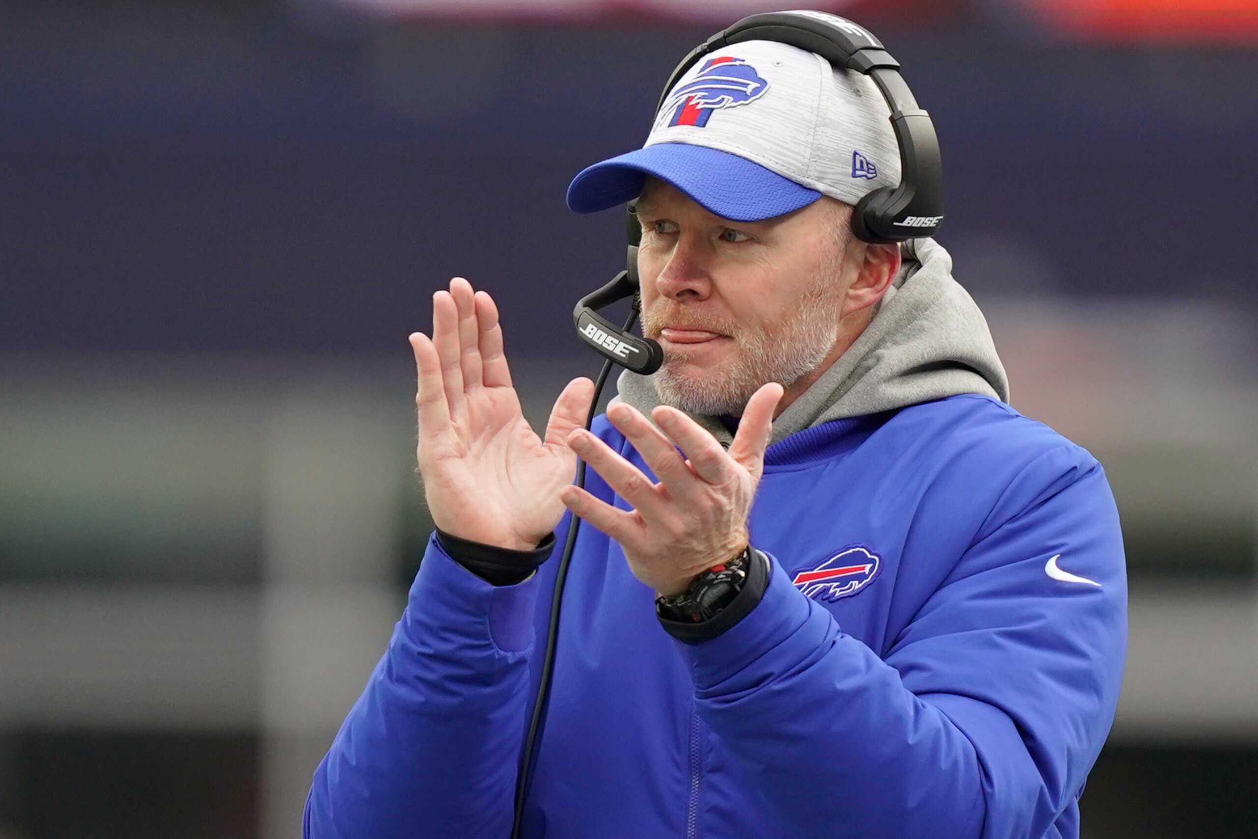 Buffalo Bills head coach Sean McDermott applauds toward his players during the first half of an NFL football game against the New England Patriots, Sunday, Dec. 26, 2021, in Foxborough, Mass. (AP Photo/Steven Senne)