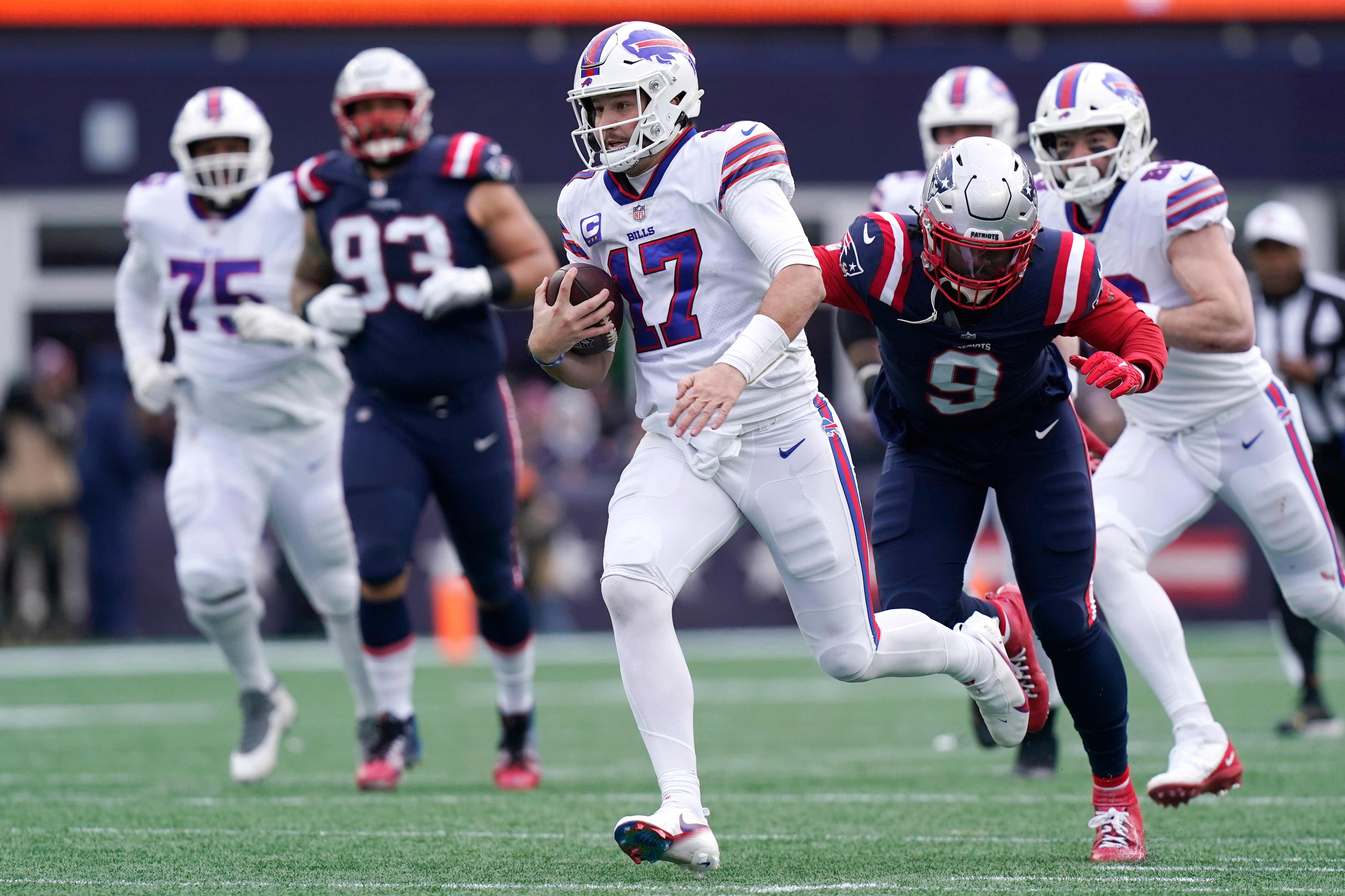 Buffalo Bills quarterback Josh Allen (17) during an NFL football game, Monday, Dec. 27, 2021, in Foxborough, Mass. (AP Photo/Steven Senne)
