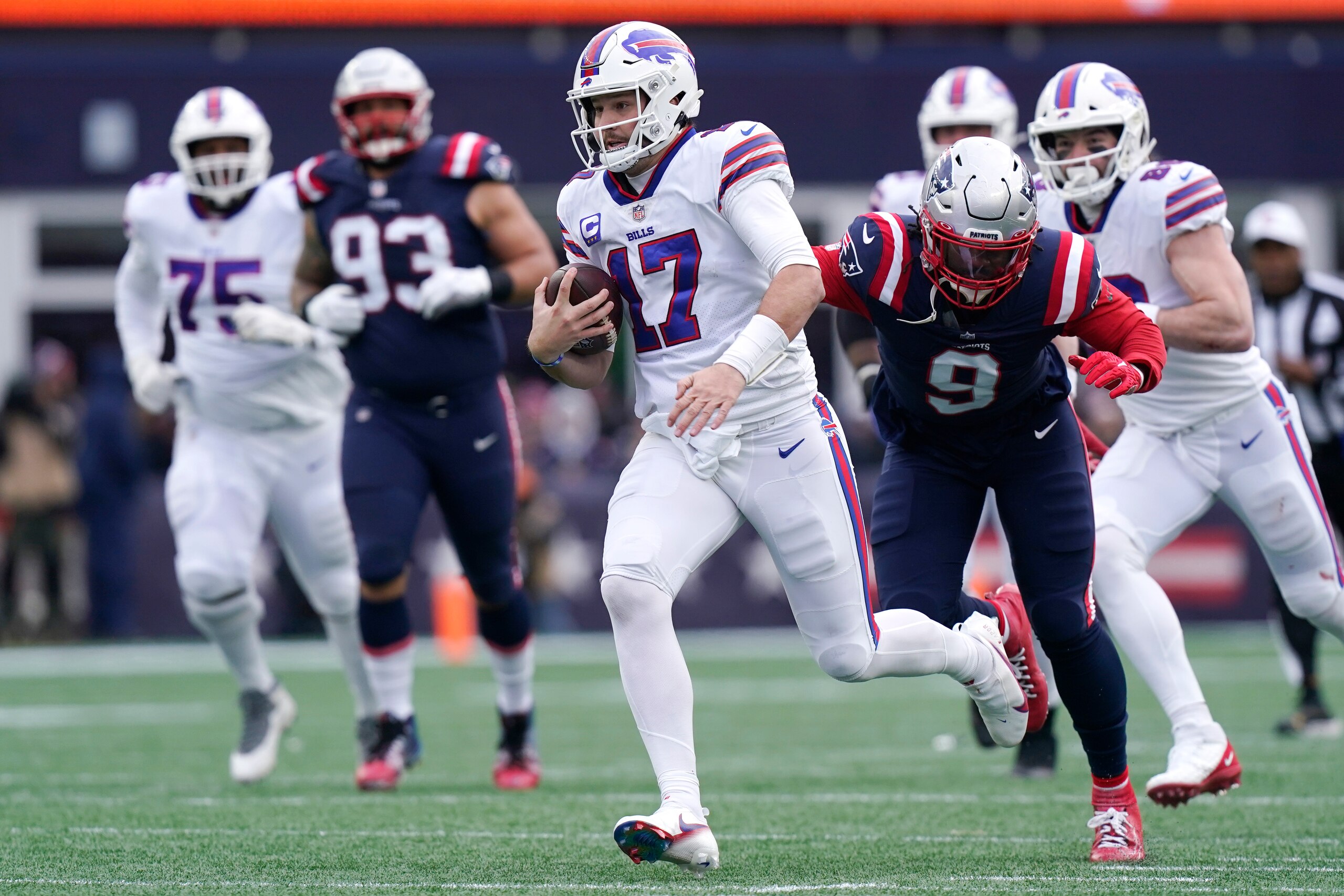 Buffalo Bills quarterback Josh Allen (17) during an NFL football game, Monday, Dec. 27, 2021, in Foxborough, Mass. (AP Photo/Steven Senne)