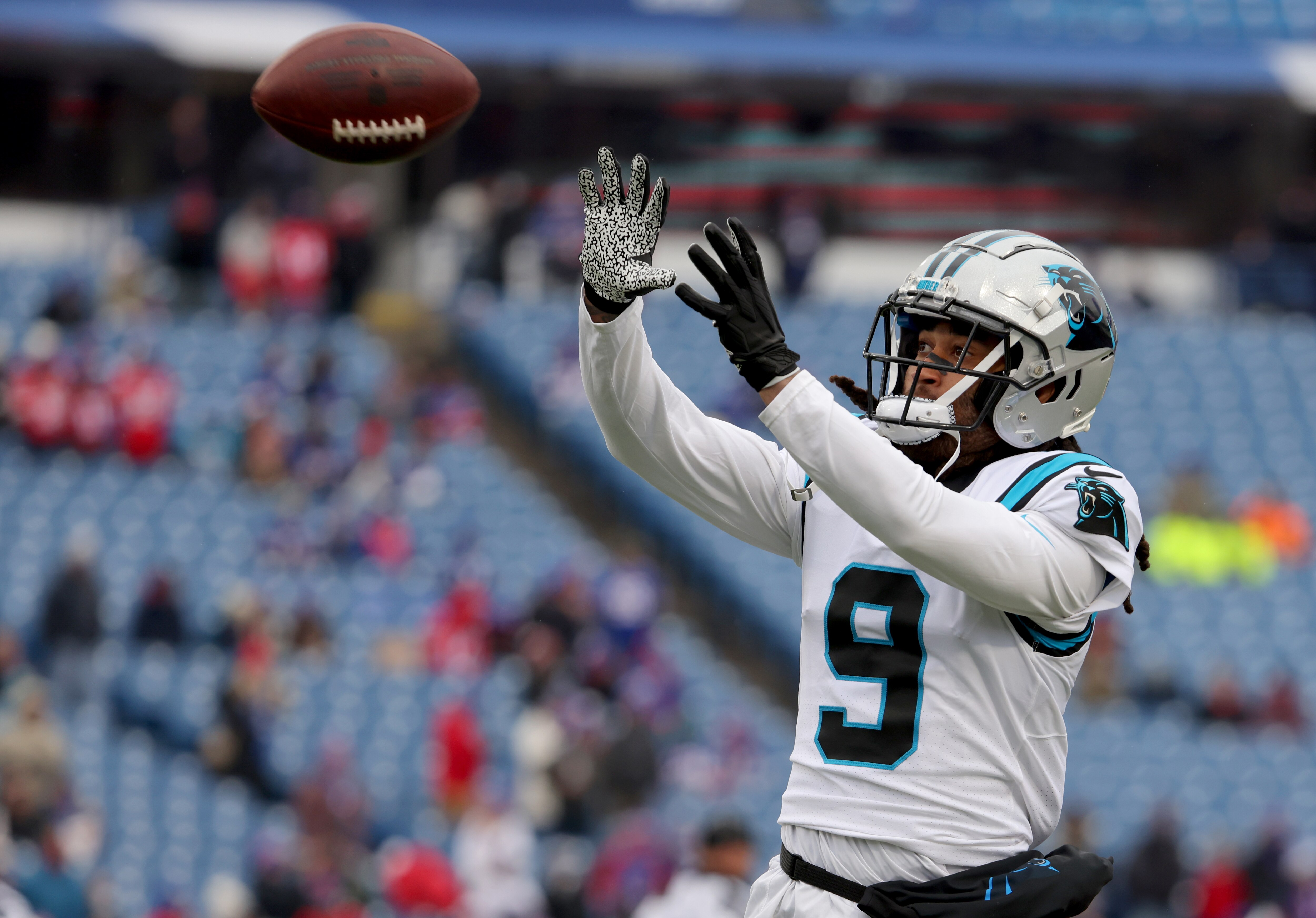 ORCHARD PARK, NEW YORK - DECEMBER 19: Stephon Gilmore #9 of the Carolina Panthers catches a pass before a game against the Buffalo Bills at Highmark Stadium on December 19, 2021 in Orchard Park, New York. (Photo by Timothy T Ludwig/Getty Images)
