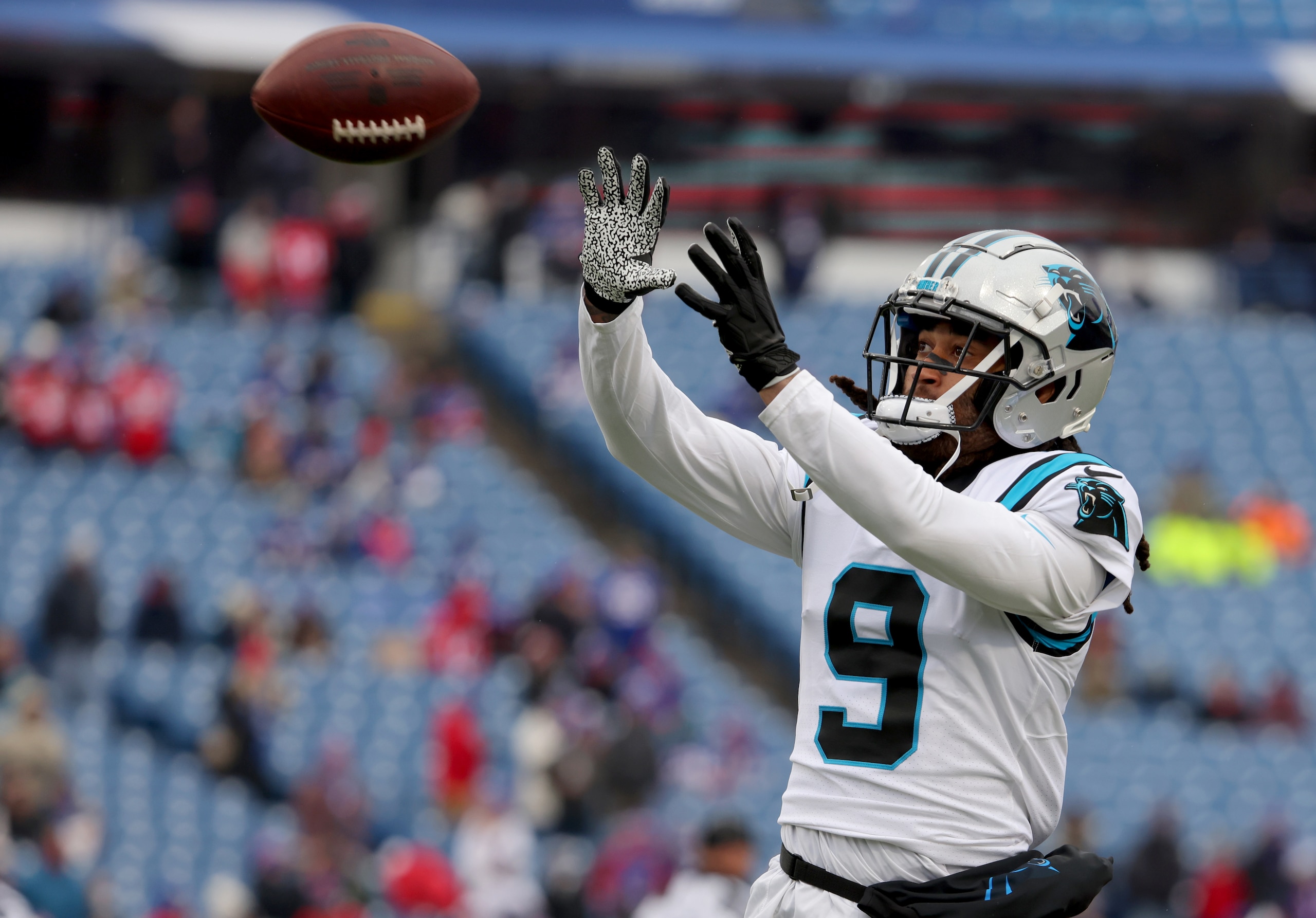 ORCHARD PARK, NEW YORK - DECEMBER 19: Stephon Gilmore #9 of the Carolina Panthers catches a pass before a game against the Buffalo Bills at Highmark Stadium on December 19, 2021 in Orchard Park, New York. (Photo by Timothy T Ludwig/Getty Images)