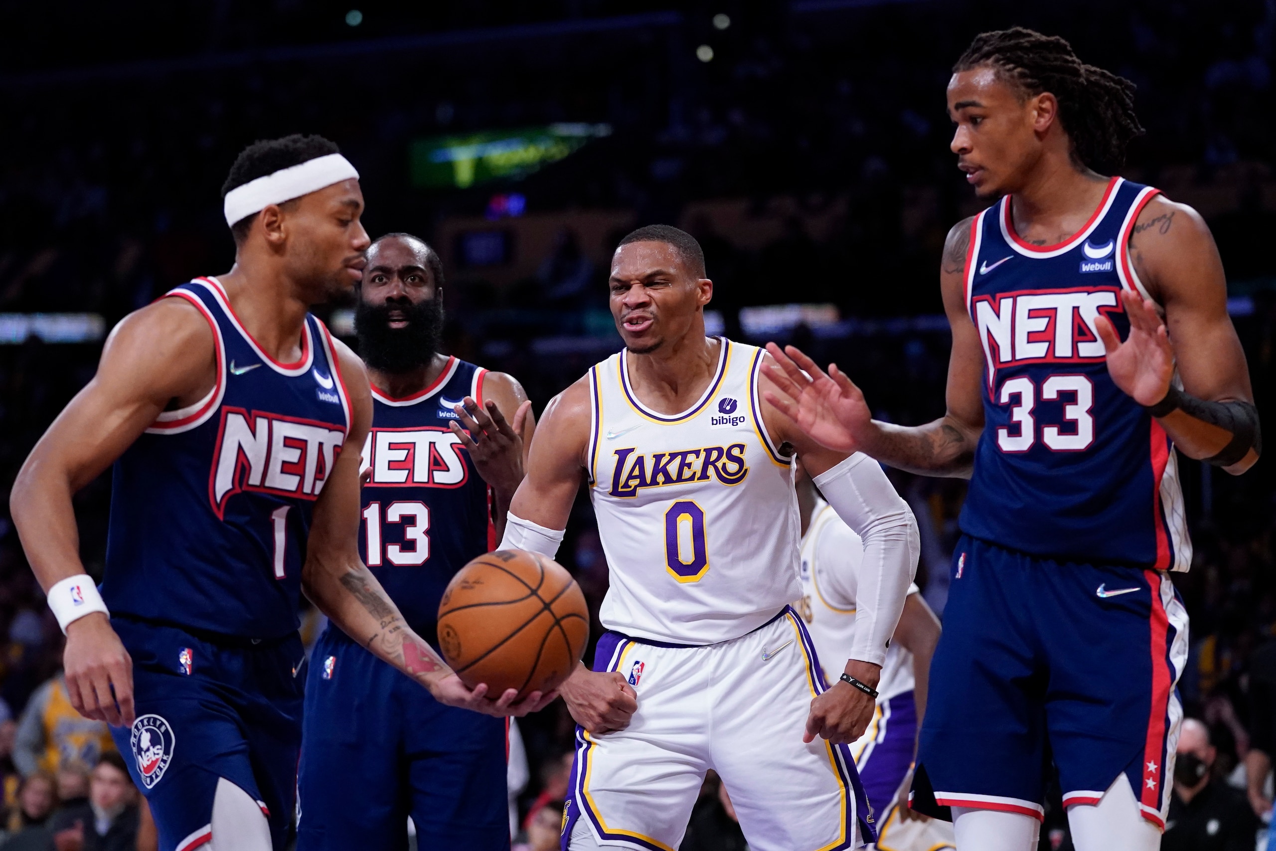 Los Angeles Lakers guard Russell Westbrook (0) celebrates after scoring during the second half of an NBA basketball game against the Brooklyn Nets in Los Angeles, Saturday, Dec. 25, 2021. (AP Photo/Ashley Landis)