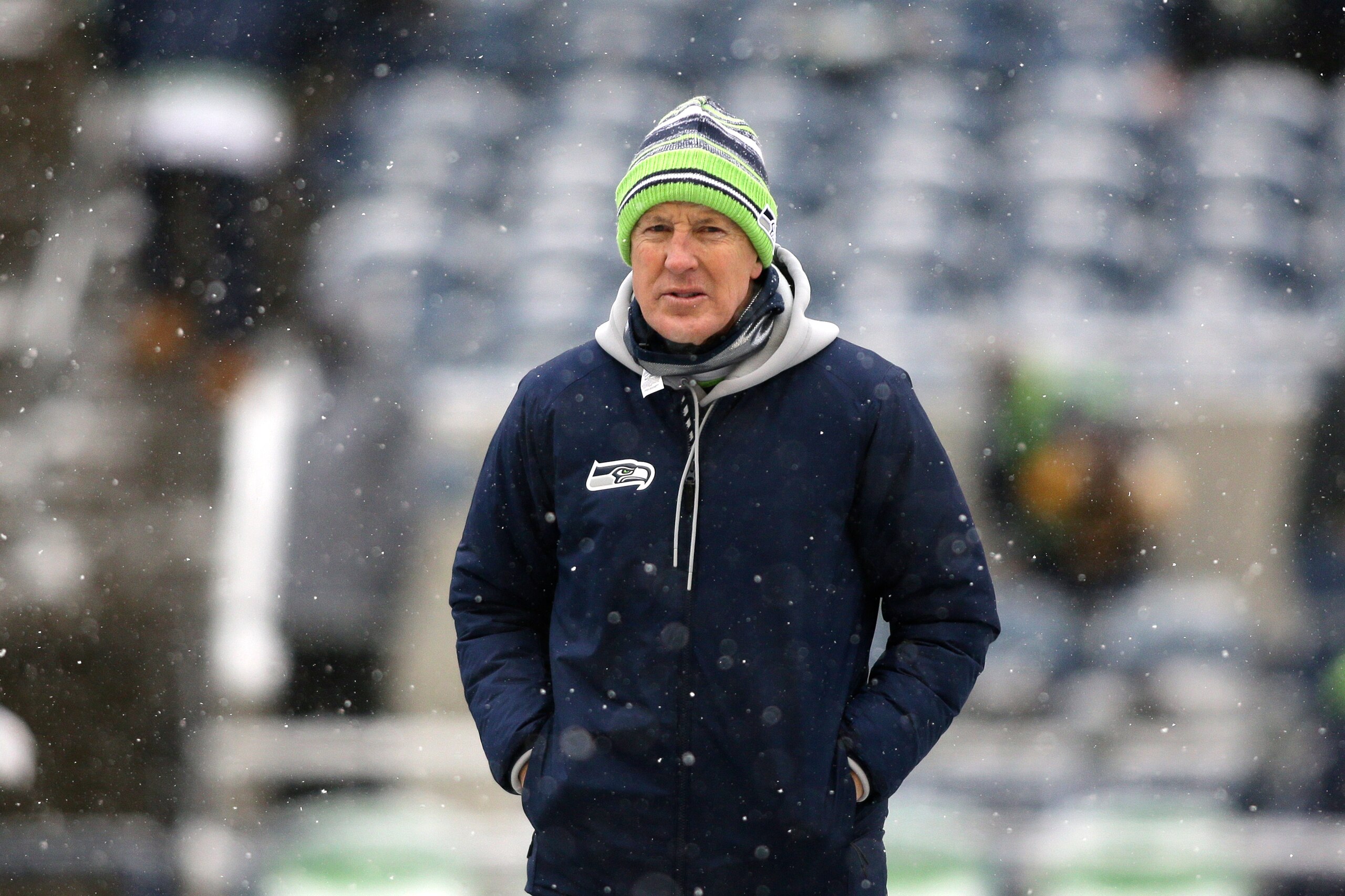 Seattle Seahawks head coach Pete Carroll walks on the field before an NFL football game against the Chicago Bears, Sunday, Dec. 26, 2021, in Seattle. (AP Photo/Lindsey Wasson)