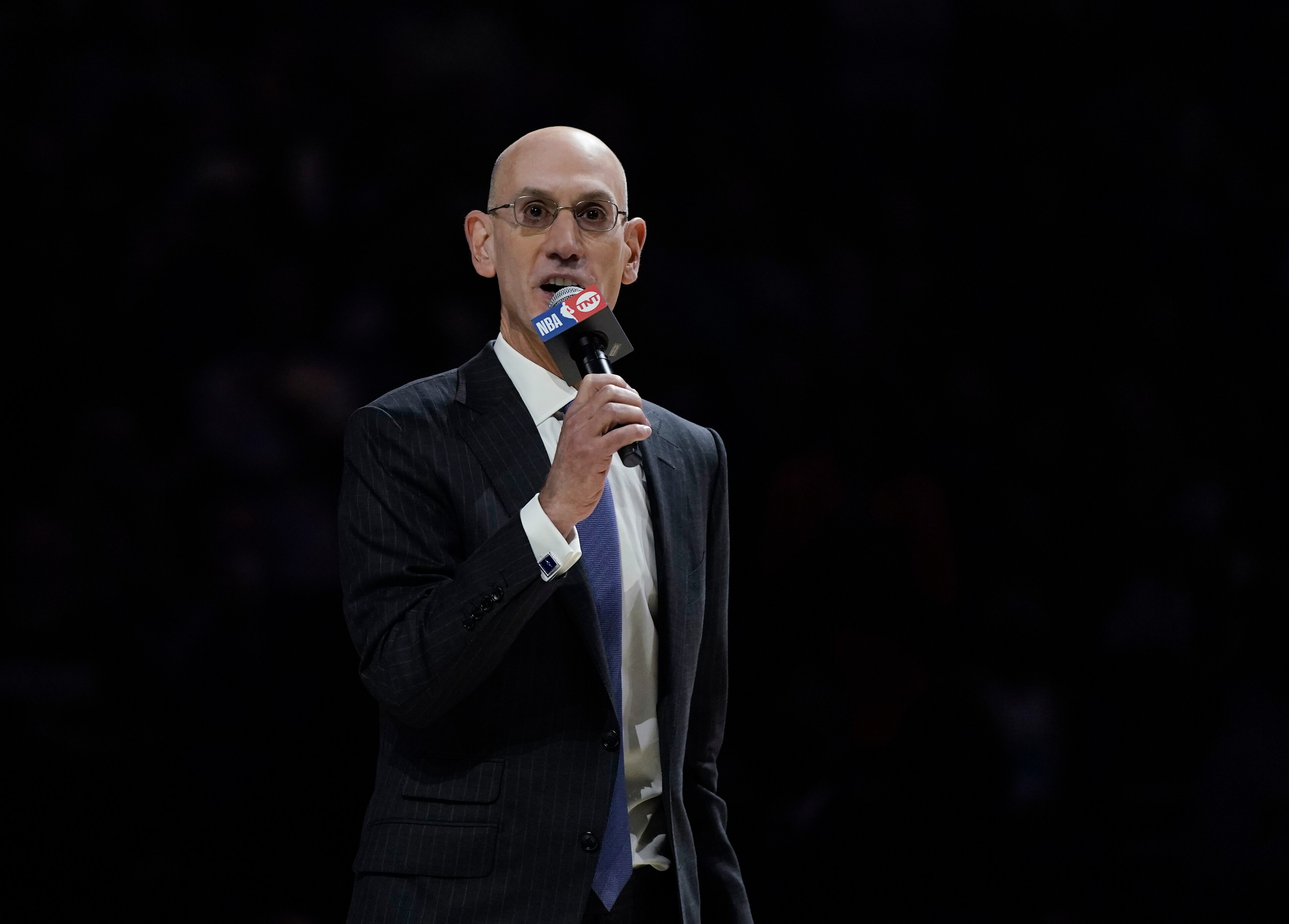 NBA Commissioner Adam Silver speaks during a ring ceremony before an NBA basketball game between the Milwaukee Bucks and the Brooklyn Nets, Tuesday, Oct. 19, 2021, in Milwaukee. (AP Photo/Morry Gash) NBA Commissioner Adam Silver speaks during a ring ceremony before an NBA basketball game between the Milwaukee Bucks and the Brooklyn Nets, Tuesday, Oct. 19, 2021, in Milwaukee. (AP Photo/Morry Gash)