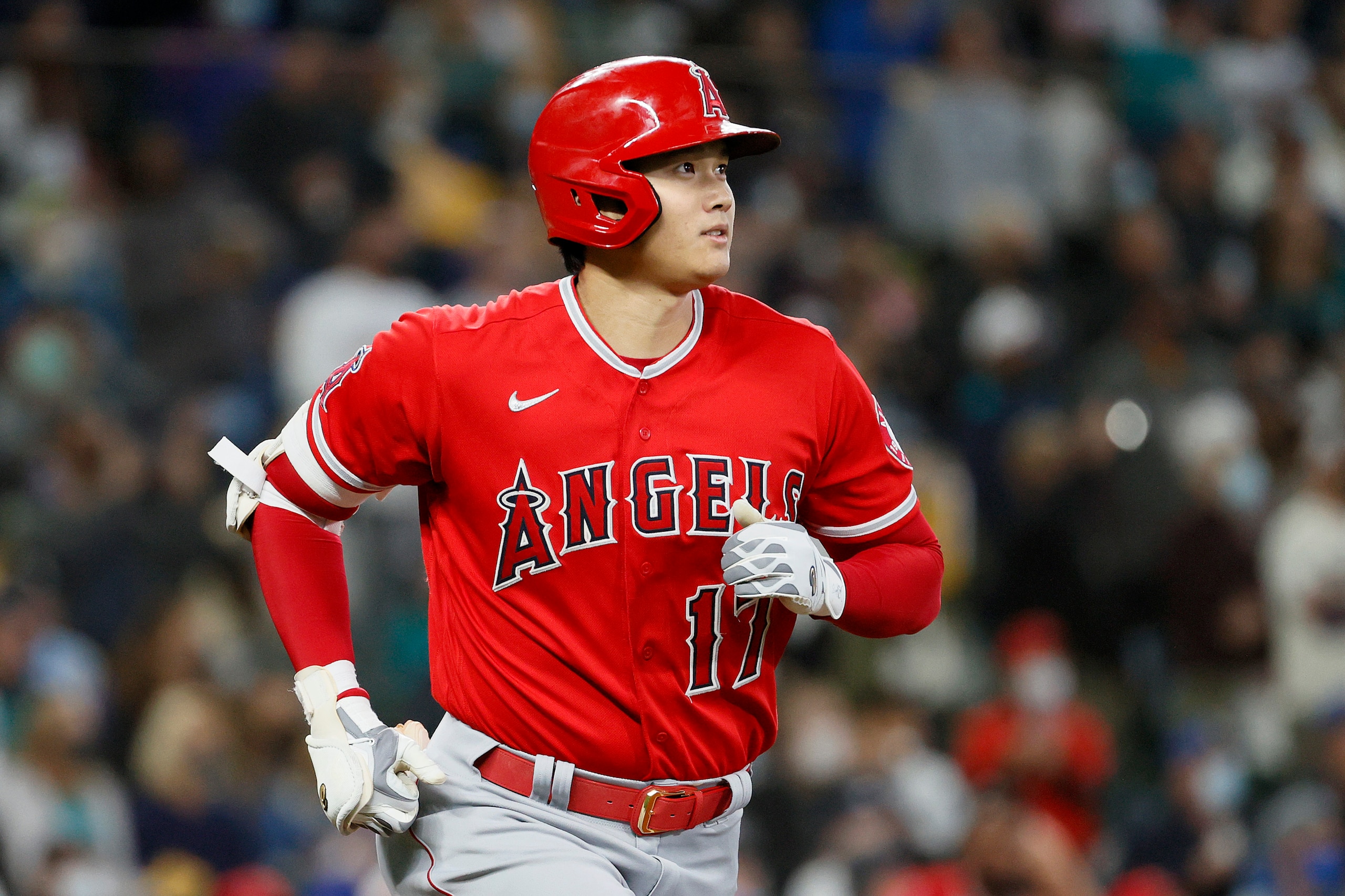 SEATTLE, WASHINGTON - OCTOBER 03: Shohei Ohtani #17 of the Los Angeles Angels watches his home run against the Seattle Mariners during the first inning at T-Mobile Park on October 03, 2021 in Seattle, Washington. (Photo by Steph Chambers/Getty Images)