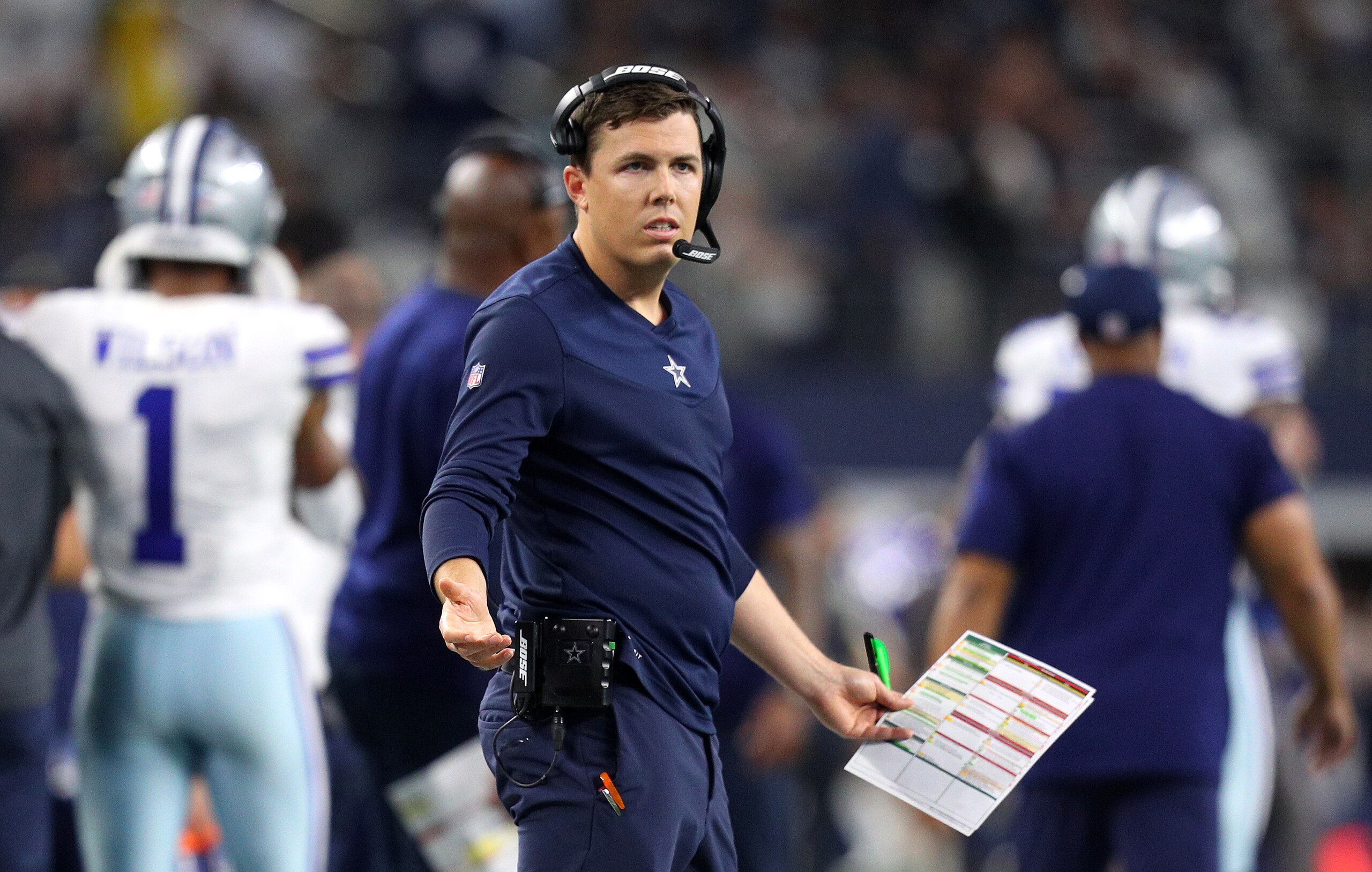 ARLINGTON, TEXAS - NOVEMBER 25: Dallas Cowboys Offensive Coordinator Kellen Moore is seen during the NFL match between Las Vegas Raiders and Dallas Cowboys at AT&T Stadium on November 25, 2021 in Arlington, Texas. (Photo by Richard Rodriguez/Getty Images)