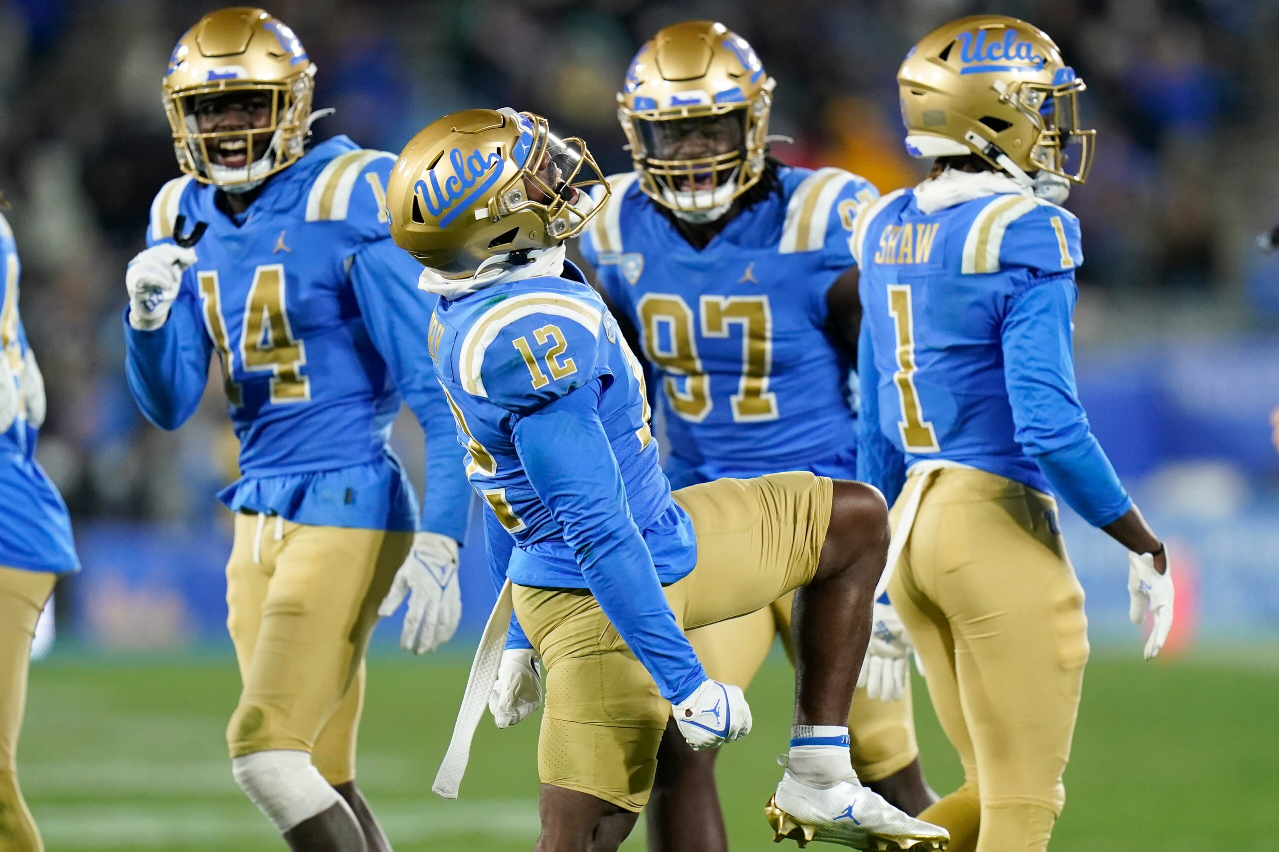 UCLA defensive back Martell Irby, center, reacts to a play during the second half of an NCAA college football game against California Saturday, Nov. 27, 2021, in Pasadena, Calif. UCLA won 42-14. (AP Photo/Jae C. Hong)