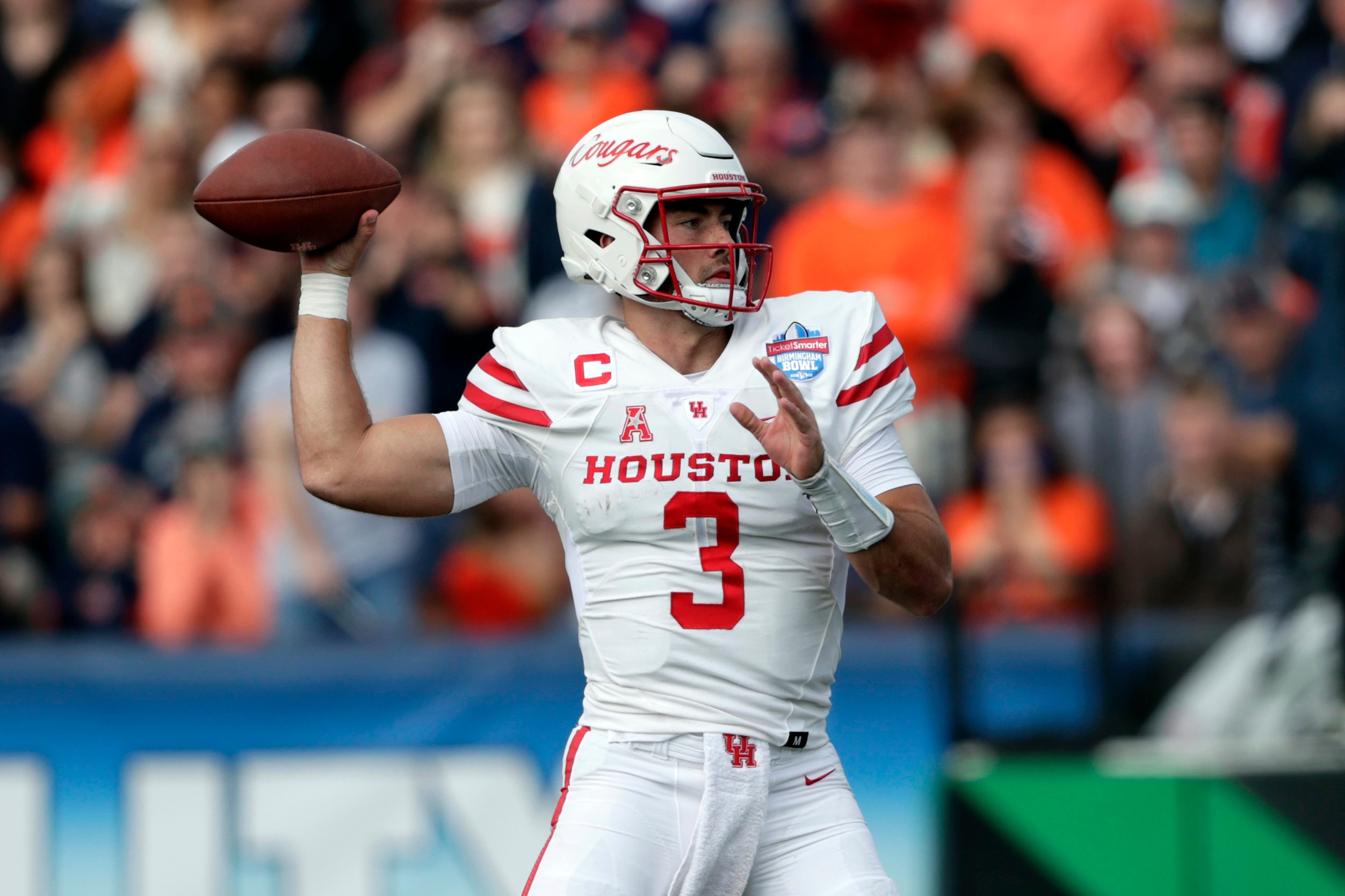 Houston quarterback Clayton Tune (3) throws a pass against Auburn during the first half of an NCAA college football game Tuesday, Dec. 28, 2021, in Birmingham, Ala. (AP Photo/Butch Dill)