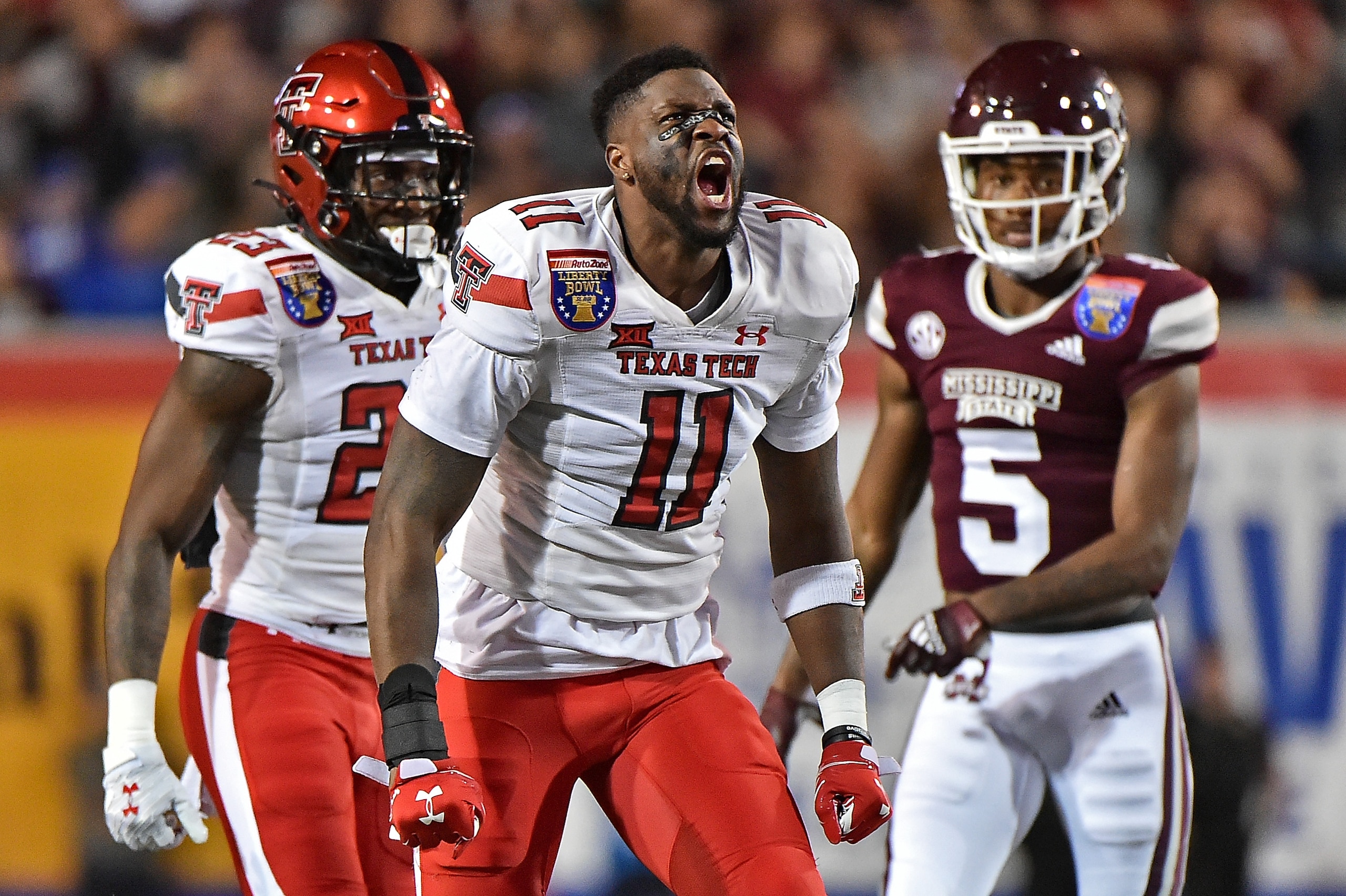 MEMPHIS, TENNESSEE - DECEMBER 28: Eric Monroe #11 of the Texas Tech Red Raiders reacts during the first half of the AutoZone Liberty Bowl against the Mississippi State Bulldogs at Liberty Bowl Memorial Stadium on December 28, 2021 in Memphis, Tennessee. (Photo by Justin Ford/Getty Images)