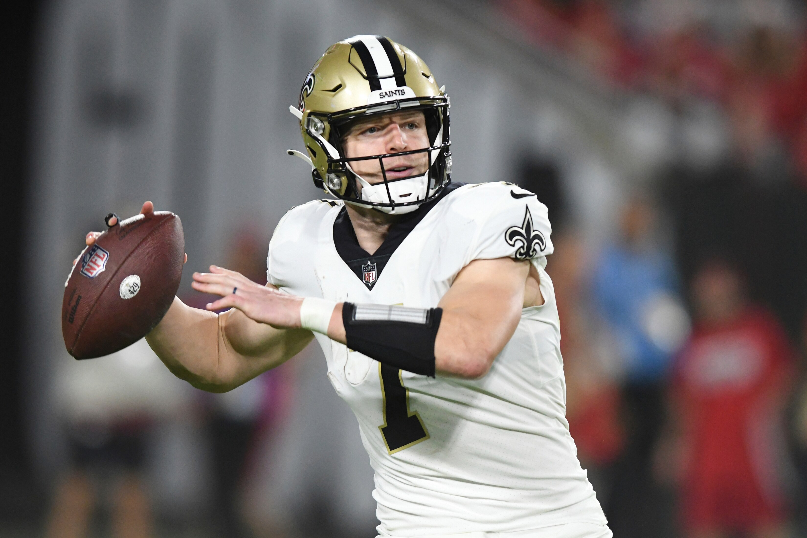 New Orleans Saints quarterback Taysom Hill (7) throws a pass against the New Orleans Saints during the second half of an NFL football game Sunday, Dec. 19, 2021, in Tampa, Fla. (AP Photo/Jason Behnken)