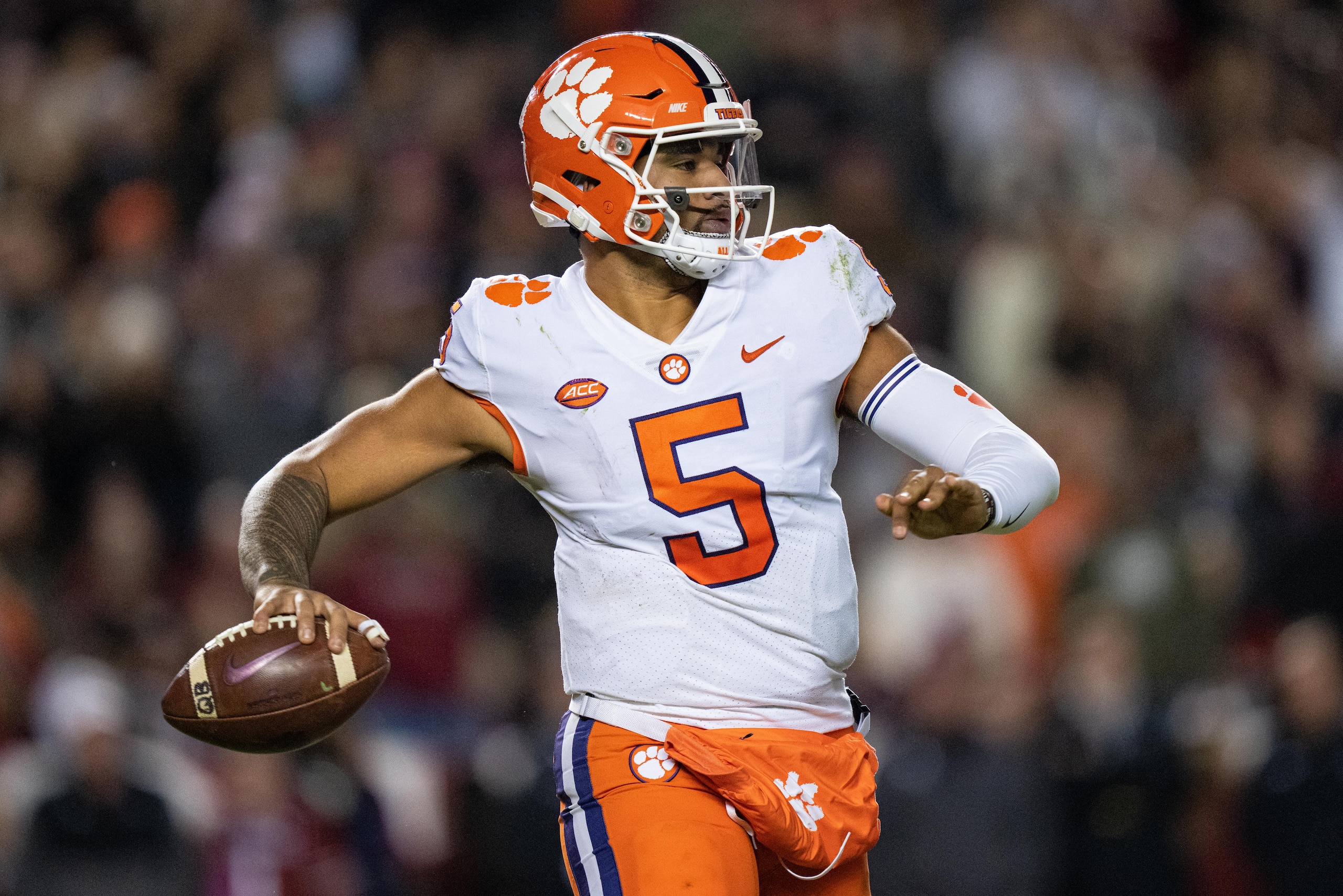 COLUMBIA, SOUTH CAROLINA - NOVEMBER 27: Quarterback D.J. Uiagalelei #5 of the Clemson Tigers looks to pass against the South Carolina Gamecocks during their game at Williams-Brice Stadium on November 27, 2021 in Columbia, South Carolina. (Photo by Jacob Kupferman/Getty Images)