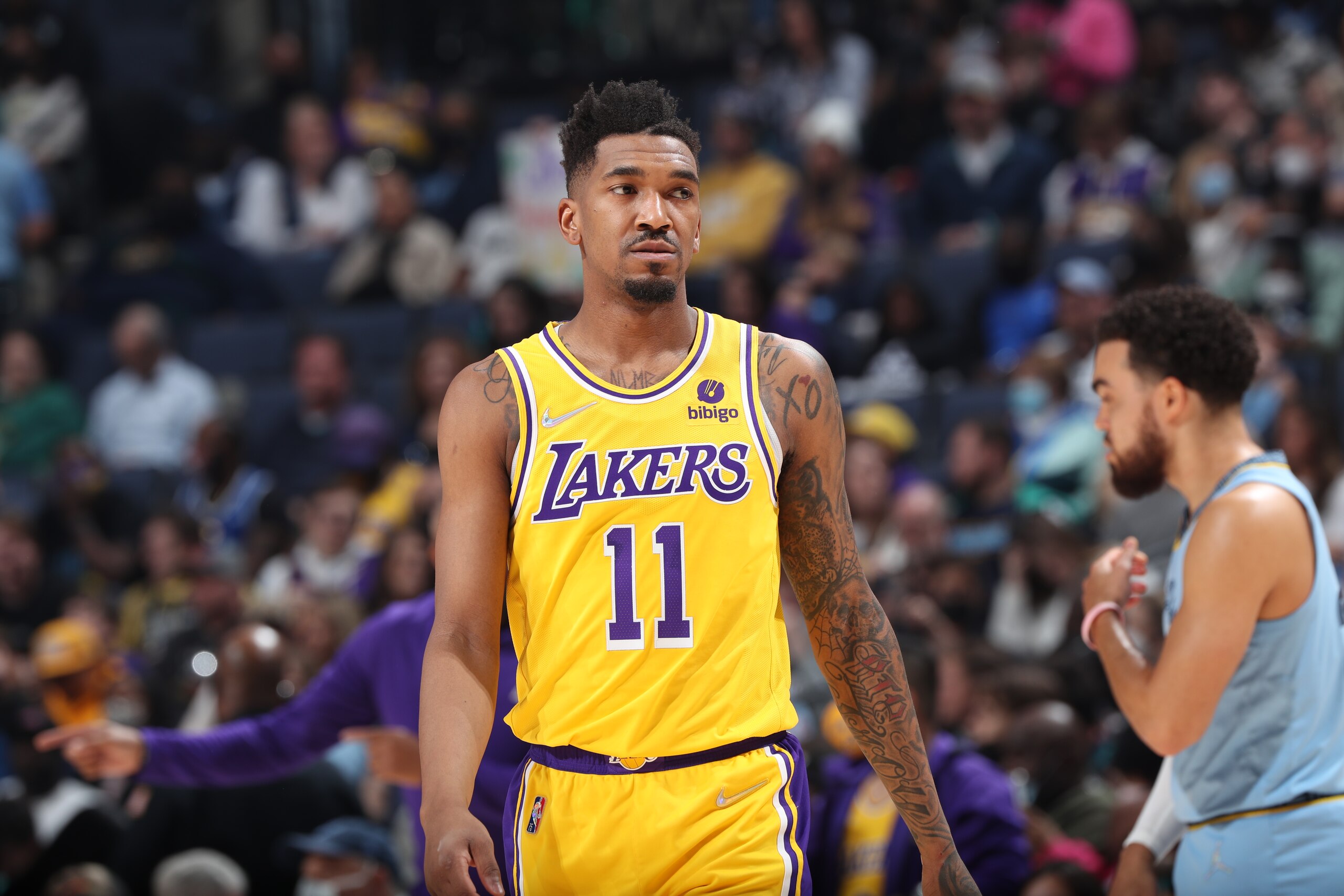 MEMPHIS, TN - DECEMBER 29: Malik Monk #11 of the Los Angeles Lakers walks on the court during a game against the Memphis Grizzlies on December 29, 2021 at FedExForum in Memphis, Tennessee. NOTE TO USER: User expressly acknowledges and agrees that, by downloading and or using this photograph, User is consenting to the terms and conditions of the Getty Images License Agreement. Mandatory Copyright Notice: Copyright 2021 NBAE (Photo by Joe Murphy/NBAE via Getty Images)