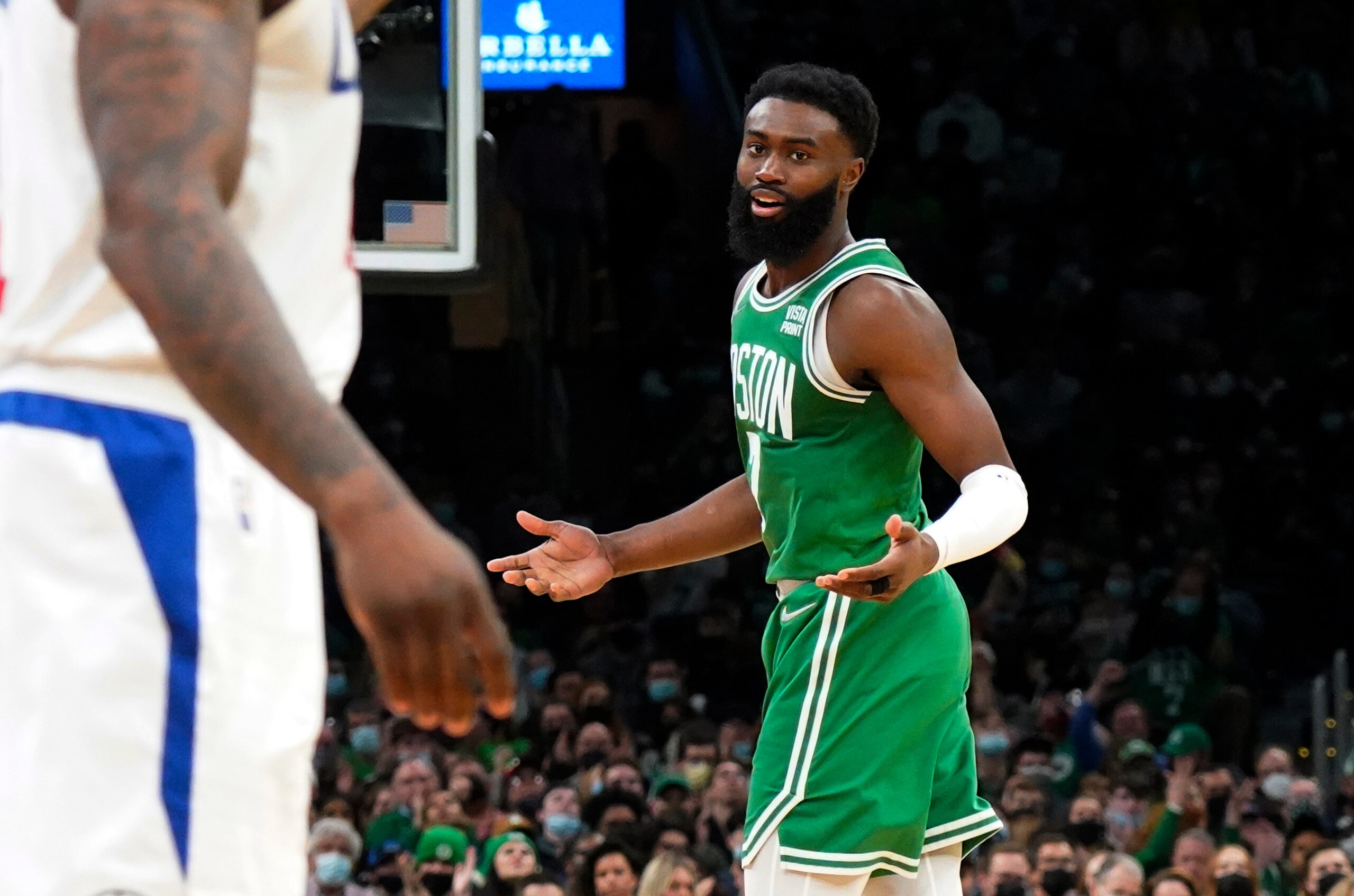 Boston Celtics guard Jaylen Brown (7) reacts to a play during the second half of the team's NBA basketball game against the Los Angeles Clippers, Wednesday, Dec. 29, 2021, in Boston. (AP Photo/Mary Schwalm)