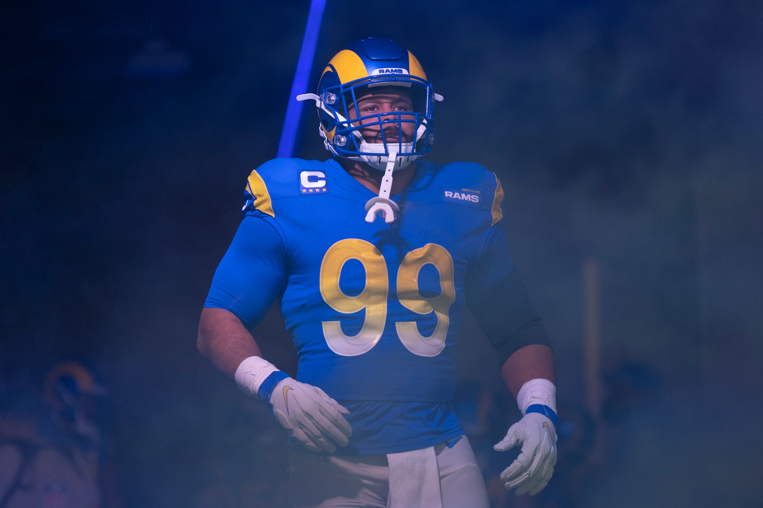 Los Angeles Rams defensive end Aaron Donald (99) prepares to enter the field before an NFL football game against the Seattle Seahawks Tuesday, Dec. 21, 2021, in Inglewood, Calif. (AP Photo/Kyusung Gong)