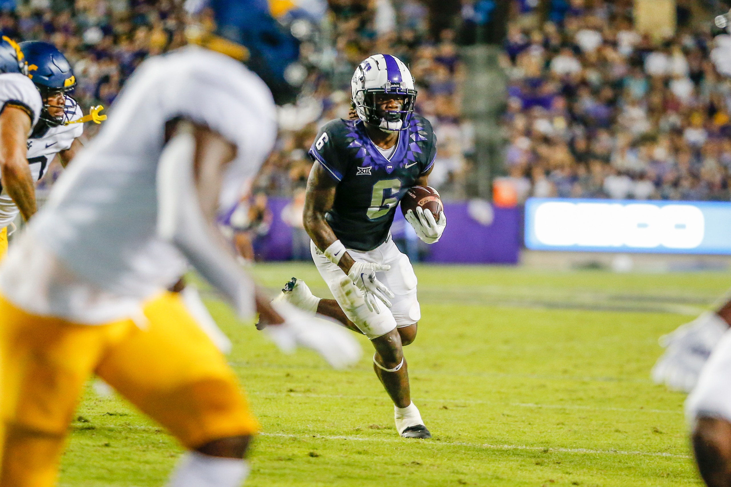 FORT WORTH, TX - OCTOBER 23: TCU Horned Frogs running back Zach Evans (6) looks for running room during the game between the TCU Horned Frogs and the West Virginia Mountaineers on October 23, 2021 at Amon G. Carter Stadium in Fort Worth, Texas. (Photo by Matthew Pearce/Icon Sportswire via Getty Images)