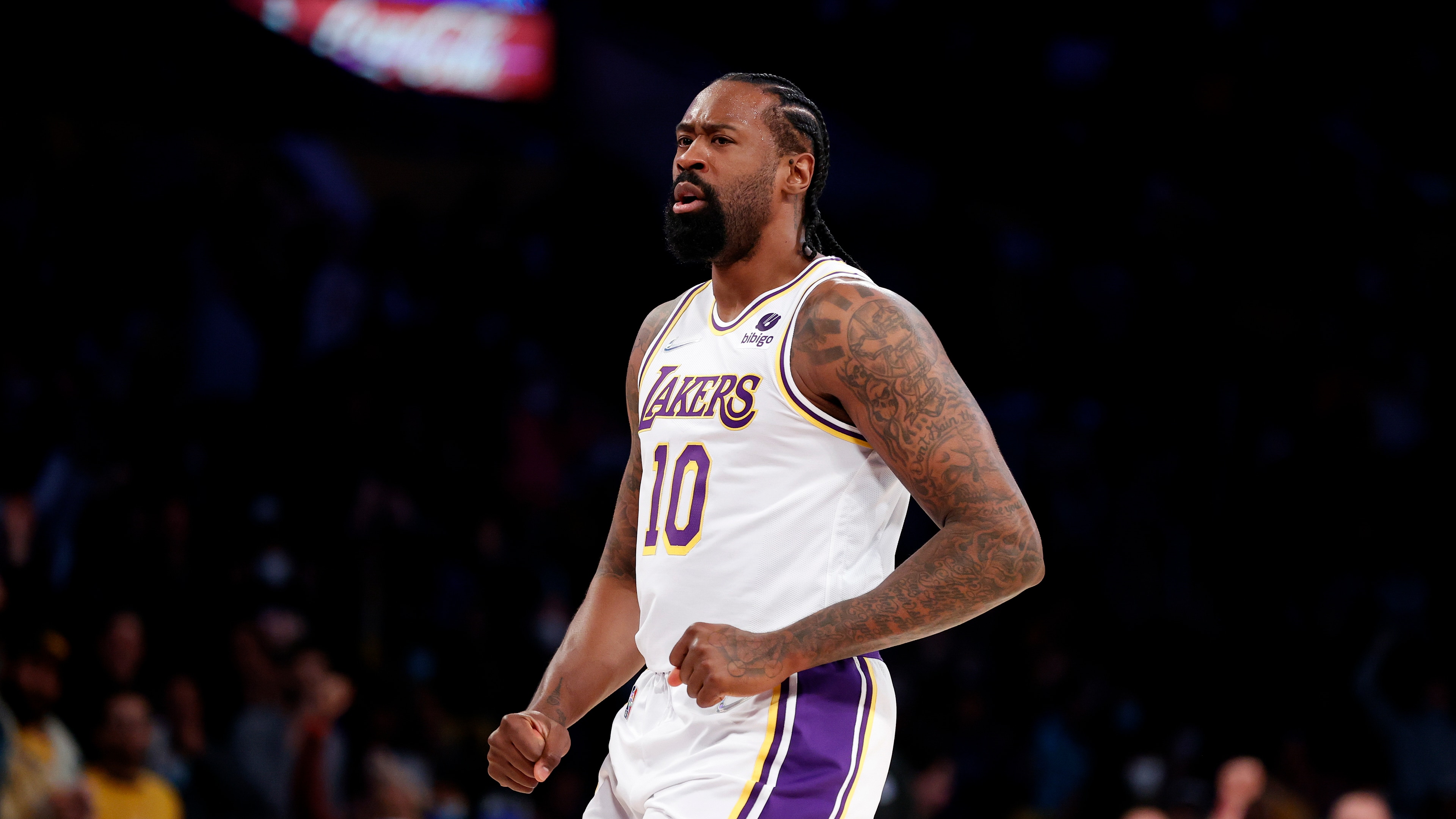 Los Angeles Lakers center DeAndre Jordan (10) reacts after makes a slam dunk against the Orlando Magic during the second half of an NBA basketball game in Los Angeles, Sunday, Dec. 12, 2021. The Lakers won 106-94. (AP Photo/Ringo H.W. Chiu)